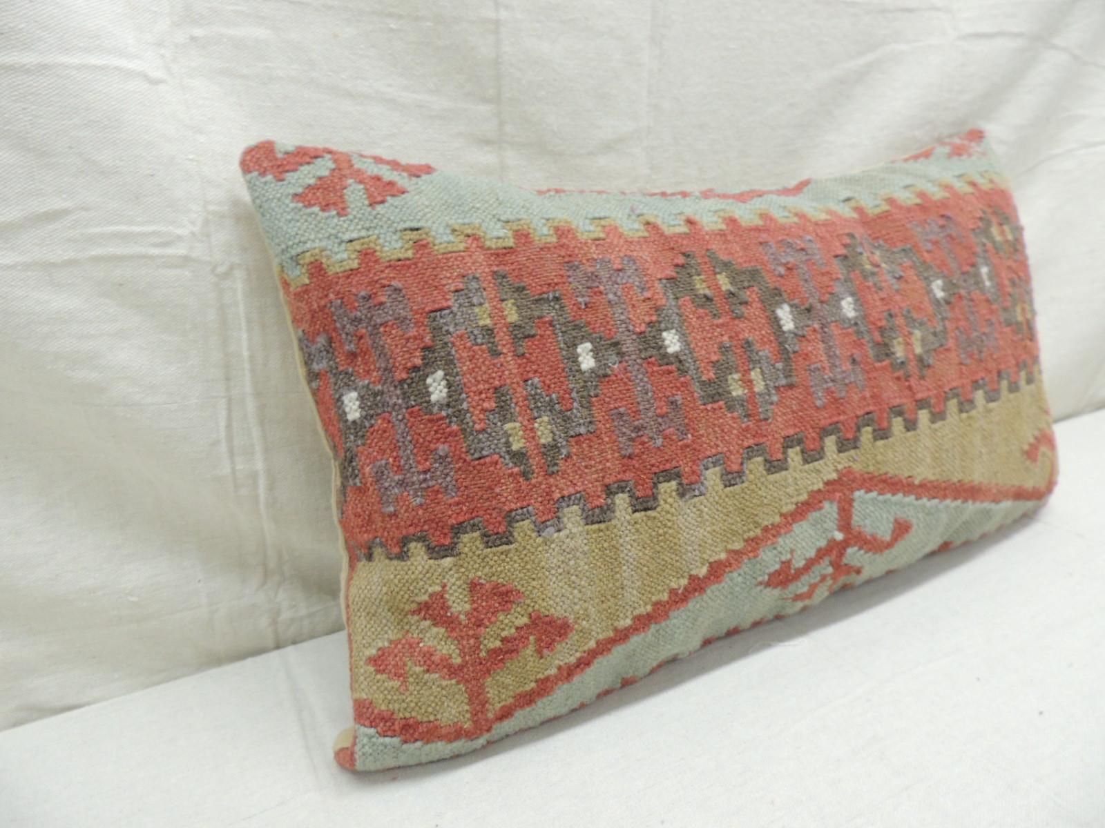 Rust and blue woven Kilim decorative bolster pillow
khaki color cotton backing.
Decorative pillow handcrafted and designed in the USA.
 Zipper closure with custom made pillow insert.
Size: 14