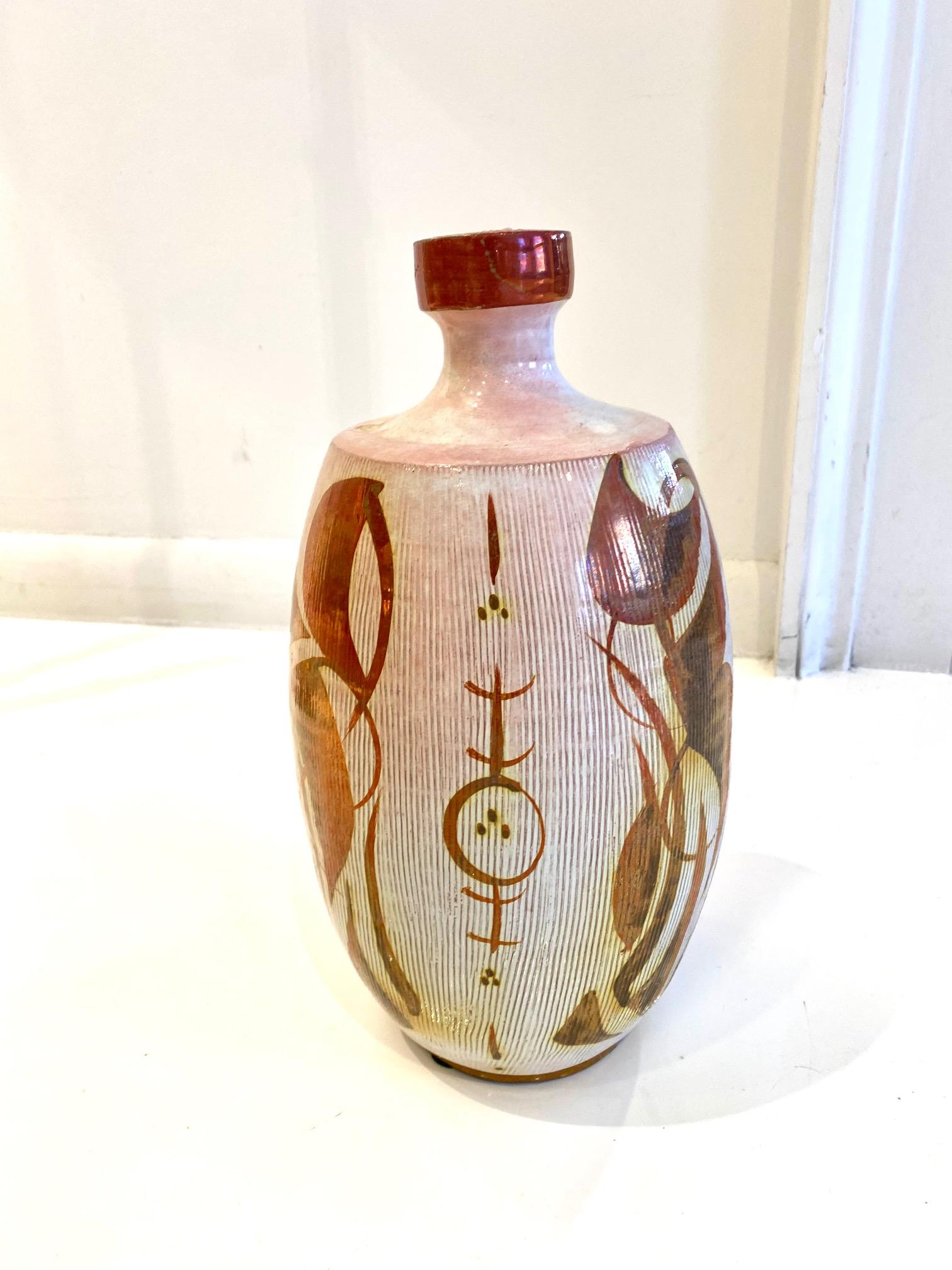 Rust and White Ceramic Bottle by Alan Caiger Smith
marked: 