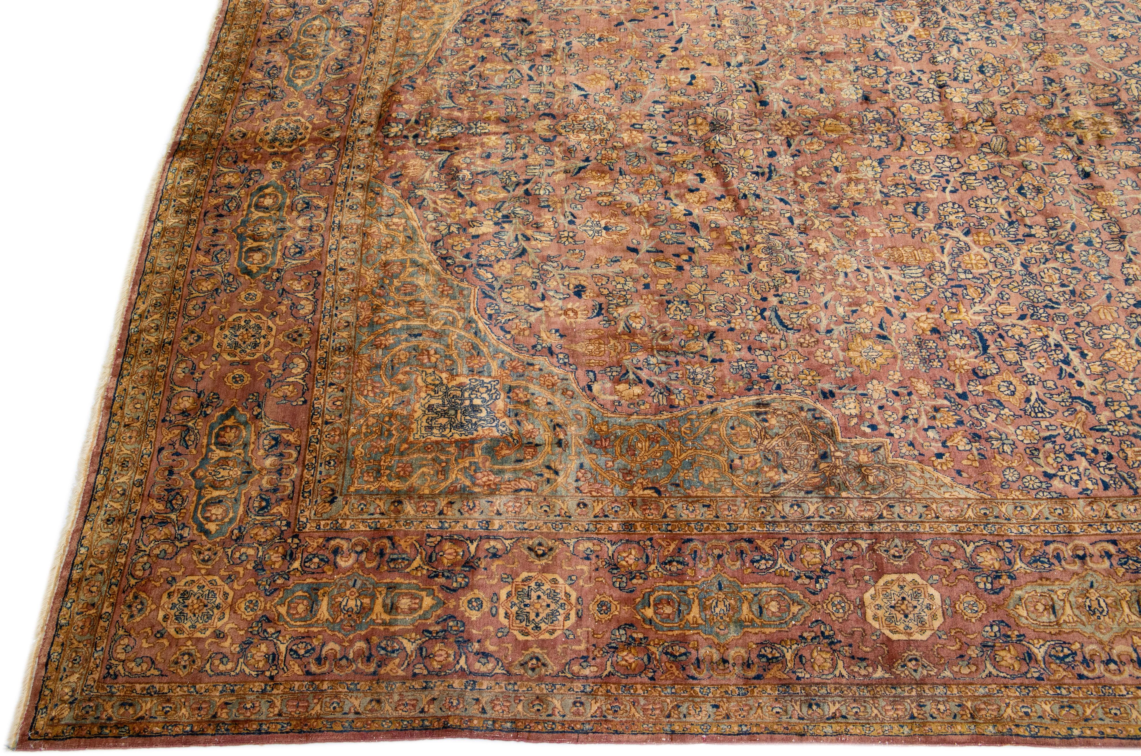 Hand-Knotted Rust Antique Kerman Handmade Rosette Designed Persian Wool Rug For Sale
