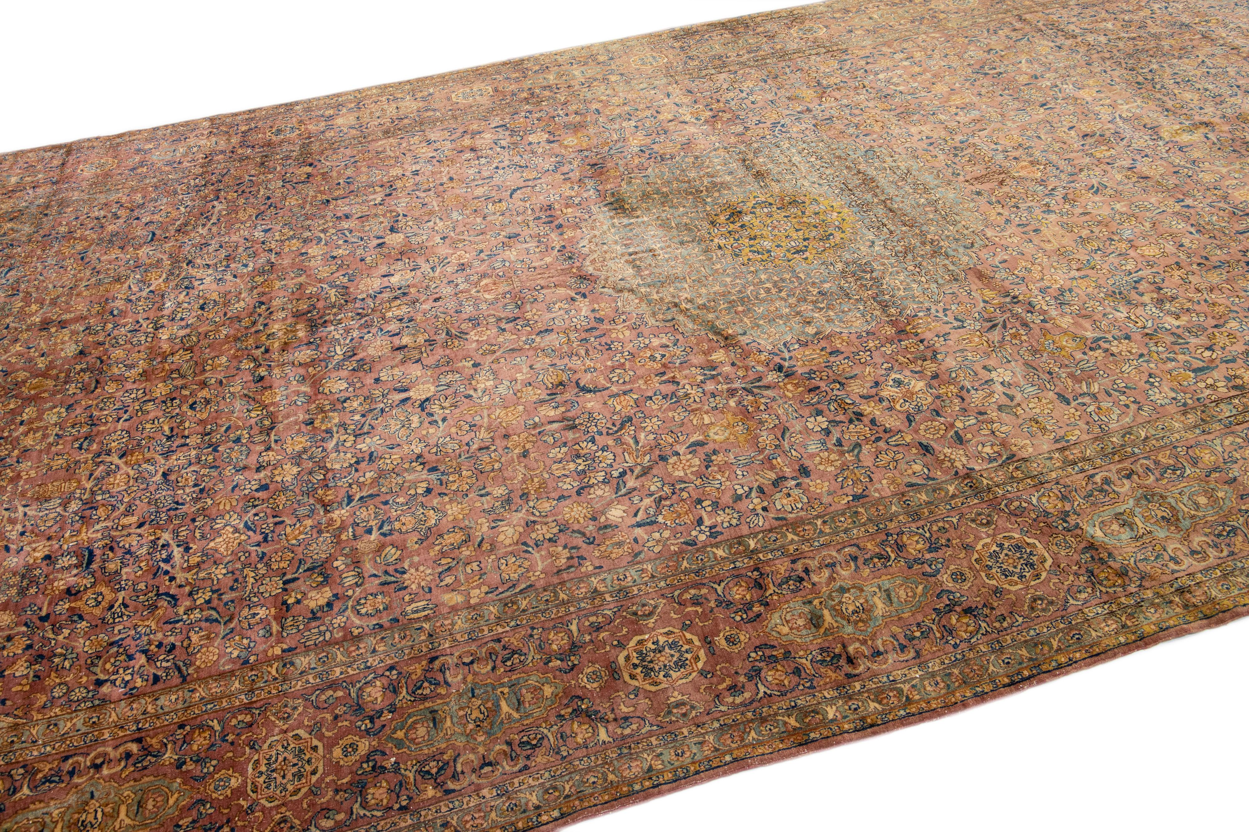 Rust Antique Kerman Handmade Rosette Designed Persian Wool Rug For Sale 1
