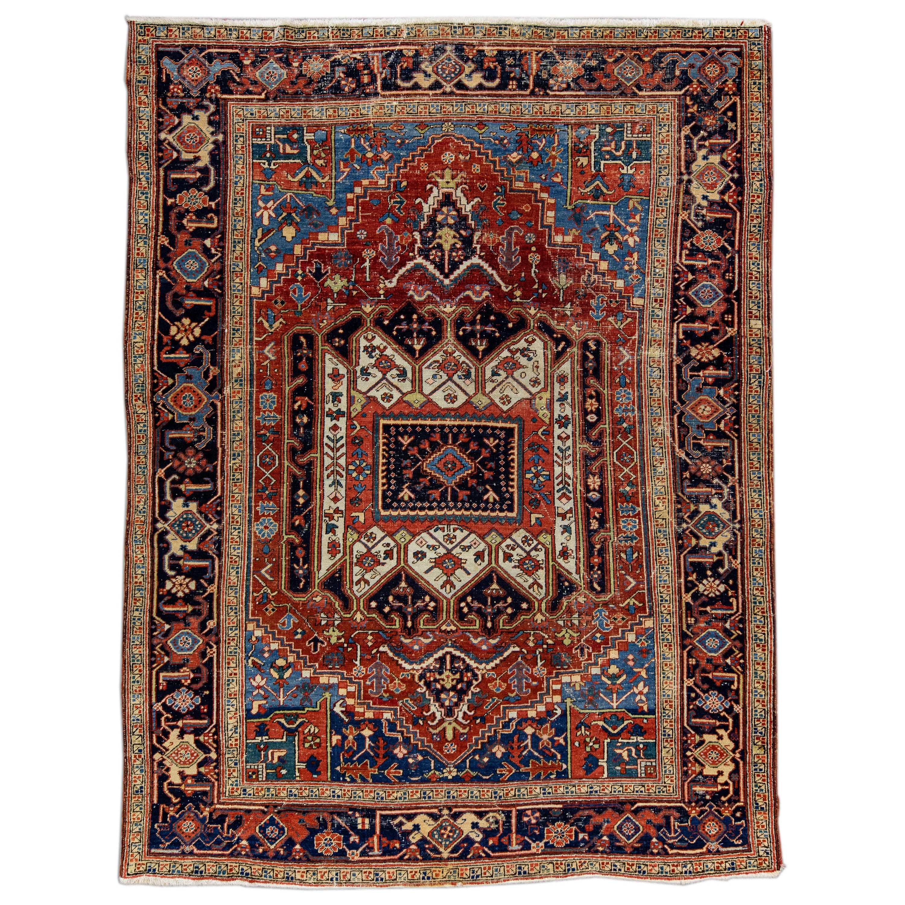 Tapis persan ancien Heriz en laine rouille, fabriqué à la main et entièrement conçu à la main