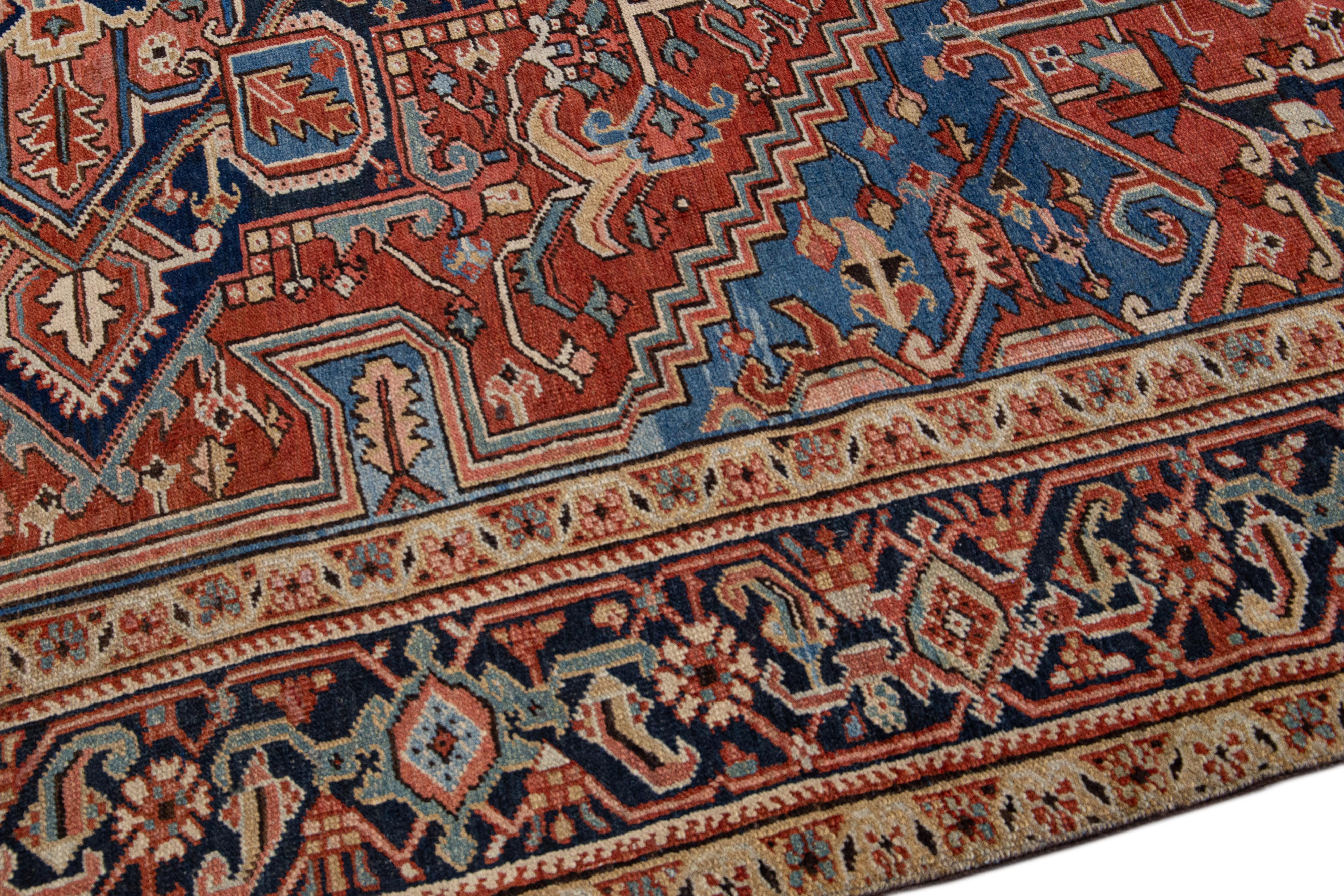 20th Century Rust Antique Persian Heriz Handmade Wool Rug with Medallion Design For Sale