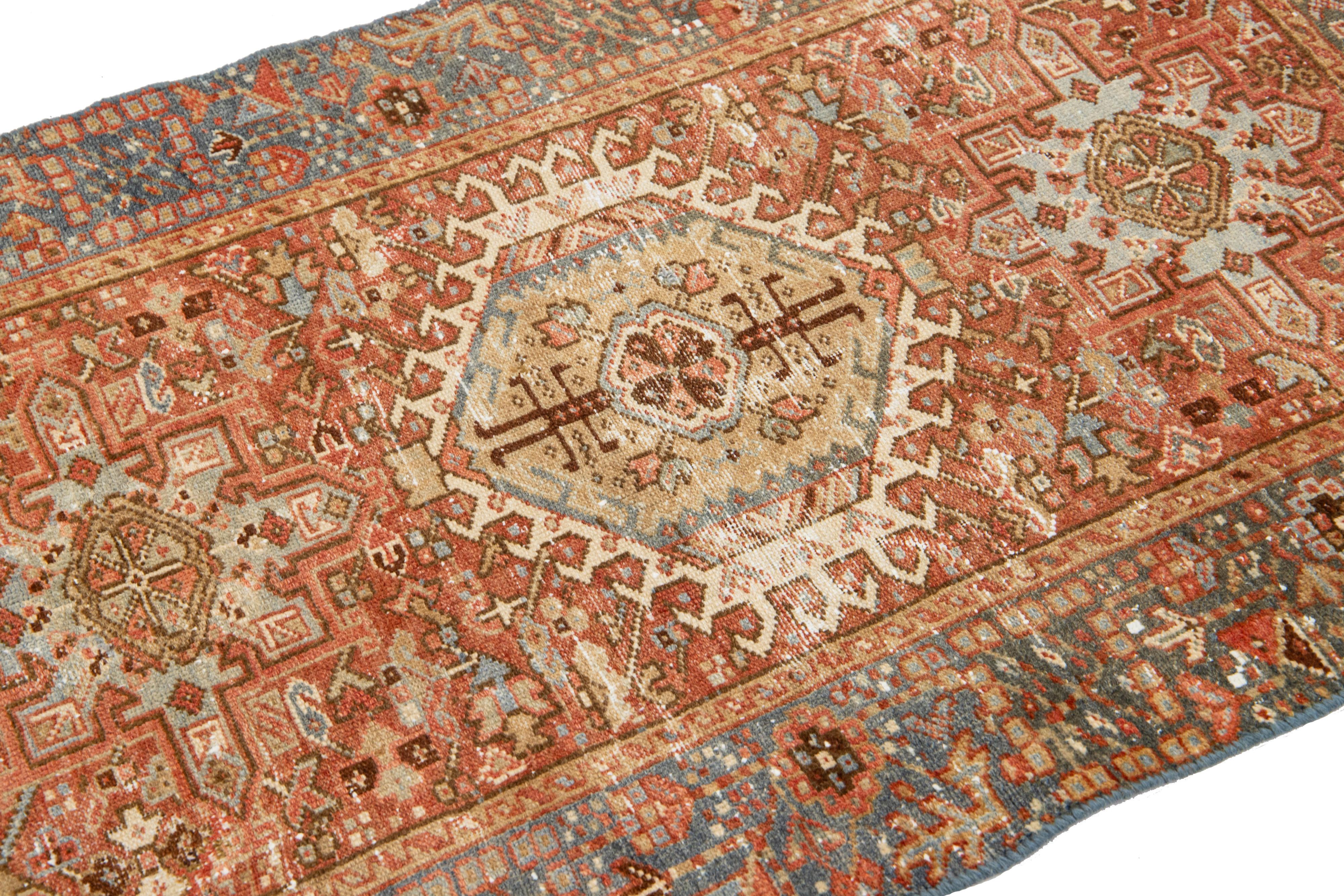 Heriz Serapi Rust Antique Persian Heriz Wool Rug Featuring an Allover Motif For Sale