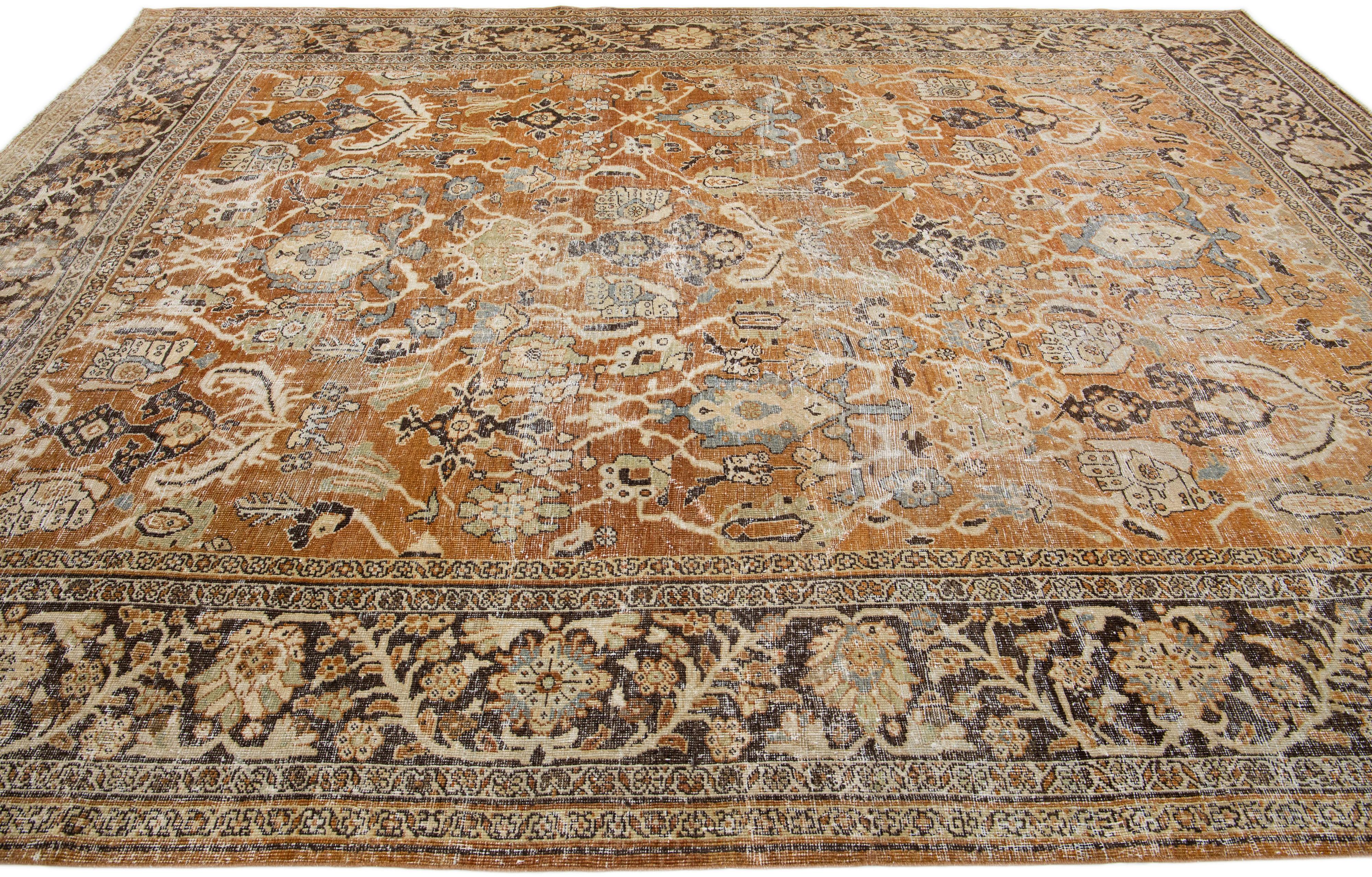 20th Century Rust Antique Persian Mahal Handmade Distressed Wool Rug With Floral Design For Sale