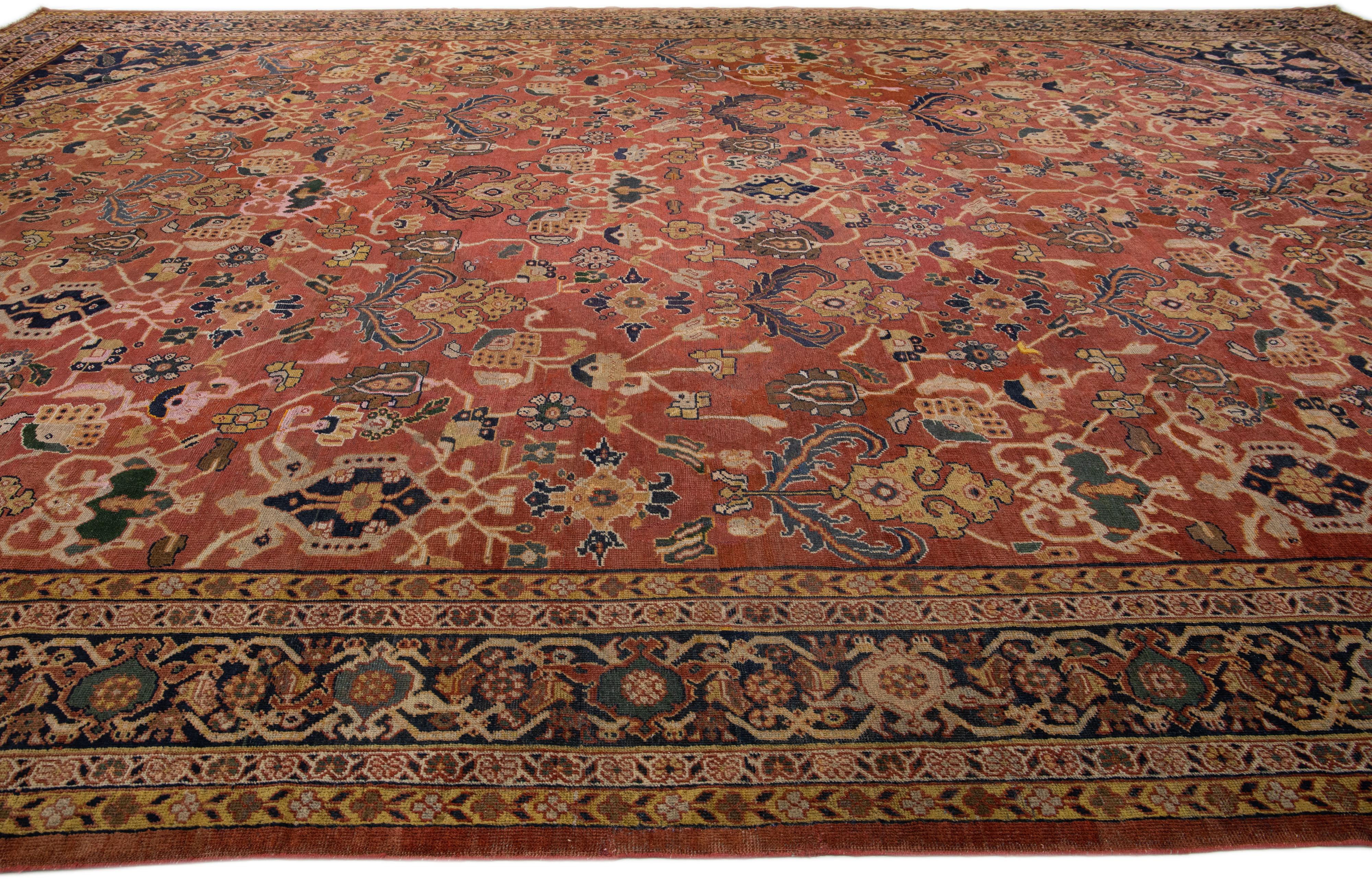Noué à la main Tapis persan Mahal ancien en laine rouille fait à la main avec motif surdimensionné sur toute sa surface en vente