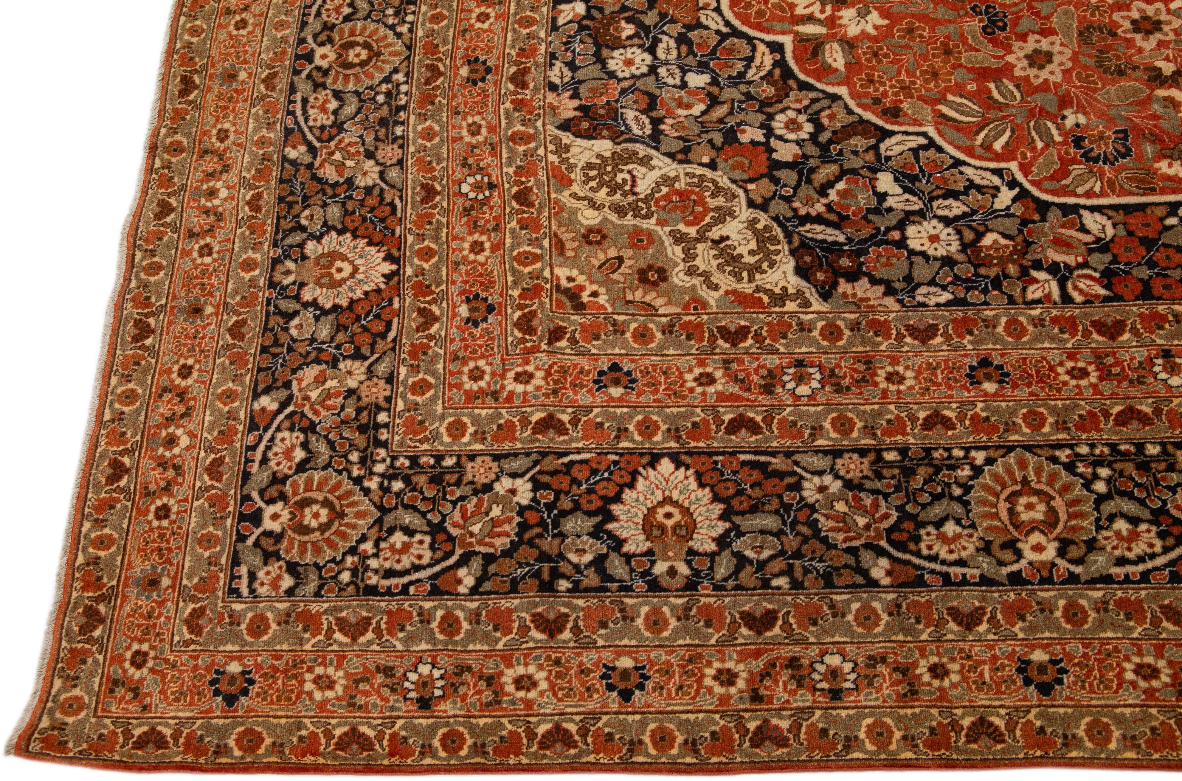 Hand-Knotted Rust Antique Tabriz Handmade Persian Wool Rug With Rosette Design For Sale