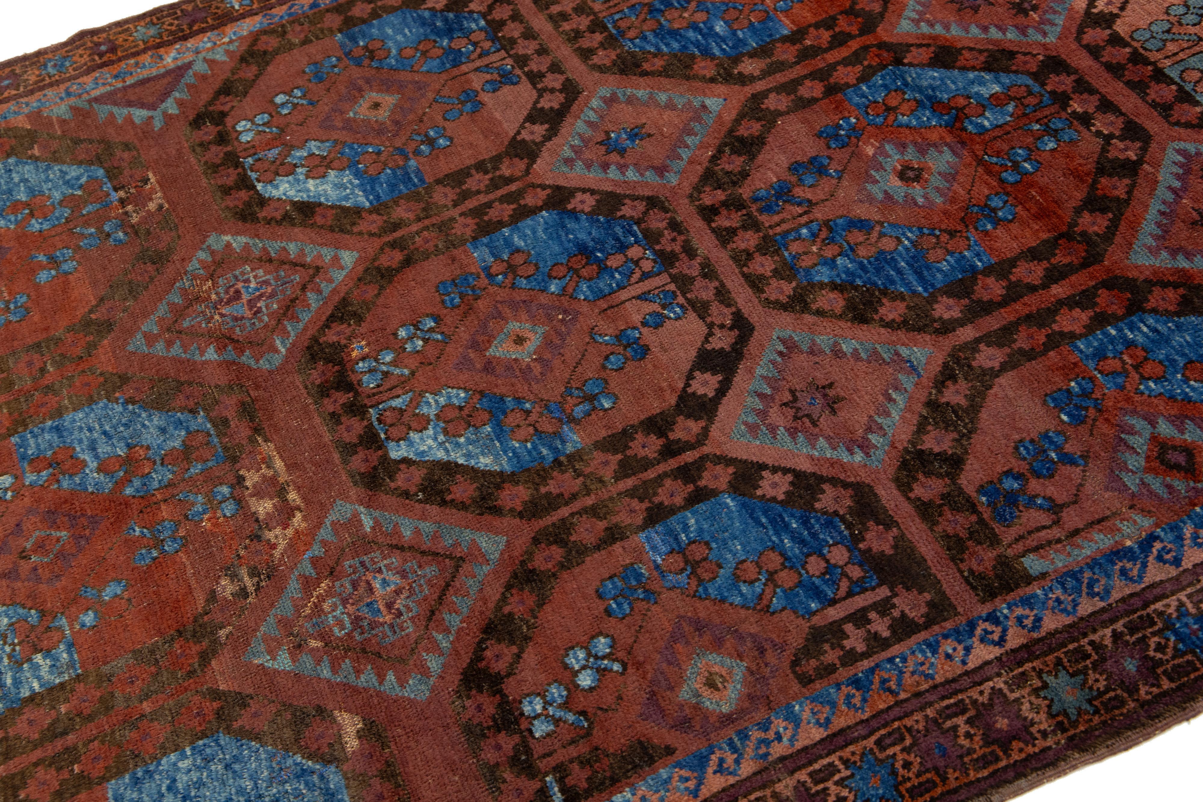 Islamic Rust Antique Turkmen Persian Wool Rug With Geometric Design For Sale