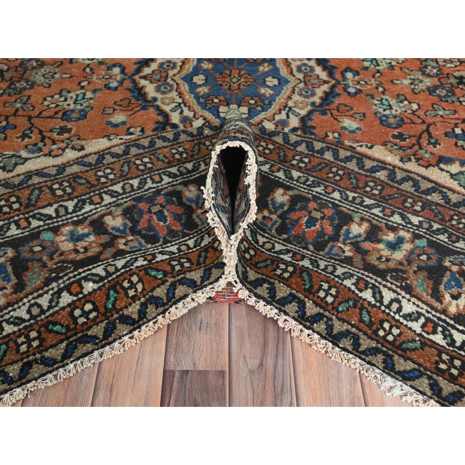 Mid-20th Century Rust Color Distressed Look Worn Wool Hand Knotted Vintage Persian Bibikabad Rug For Sale