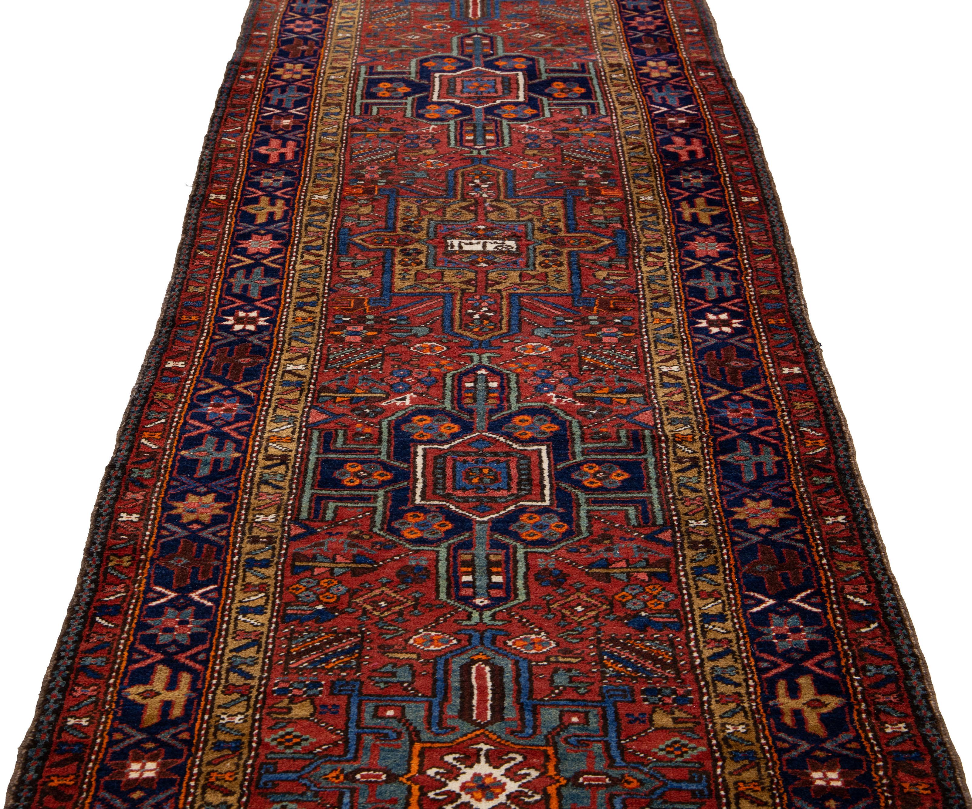 Beautiful vintage Karajah hand-knotted Wool rug with a rust color field. This Kalajah rug has multi-color accents in a gorgeous all-over geometric design.

This rug measures: 3'7