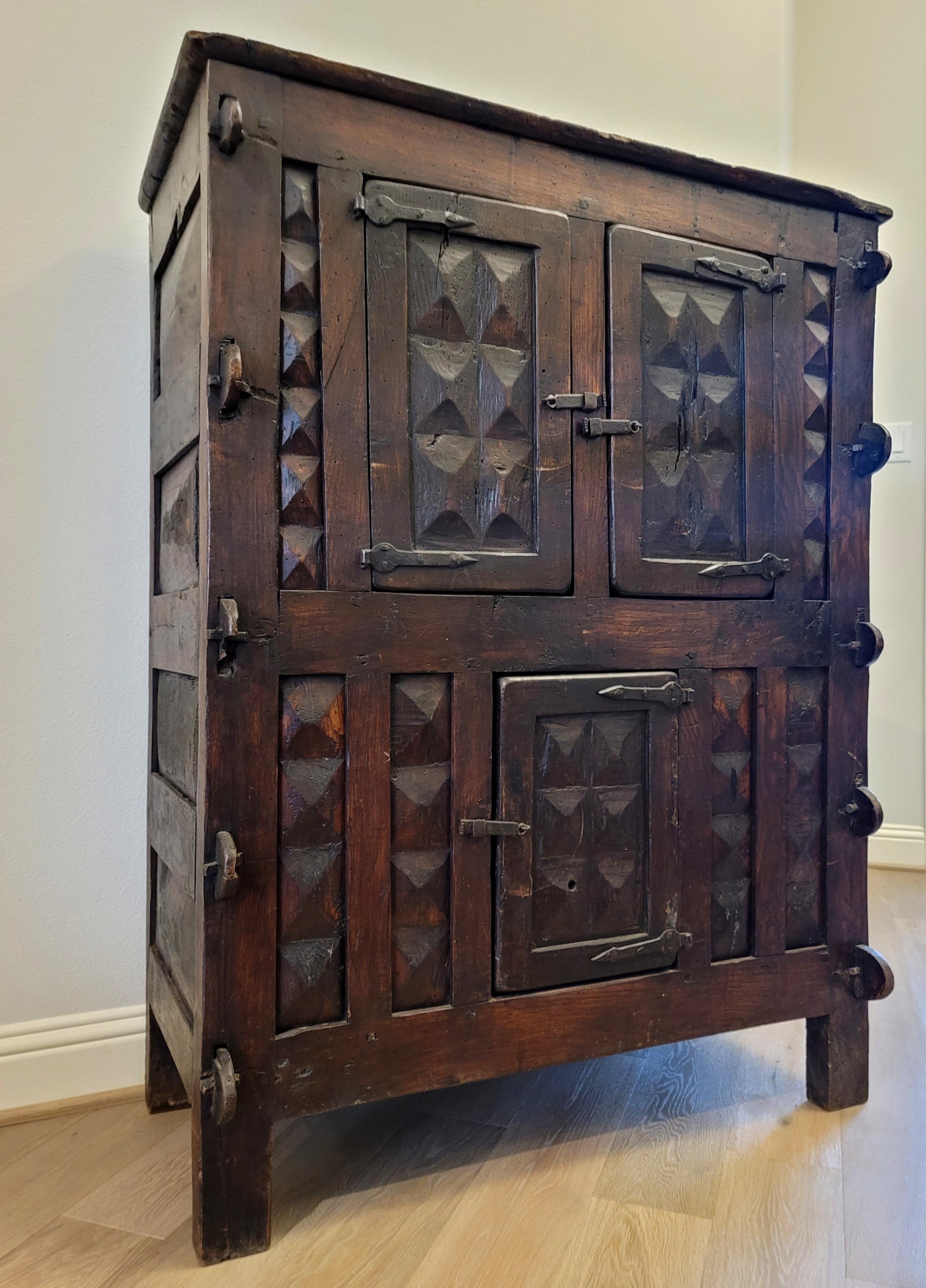 A scarce Baroque period Continental Europe country farmhouse cabinet or kitchen cupboard, displaying lots of charming antique character, warmth and beautiful dark rich patina!

Born in the 18th century, likely originating in the Iberian Peninsula