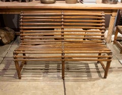 Rustic 1930 Antique Wooden Bench with Rod Backrest and Metal Accents