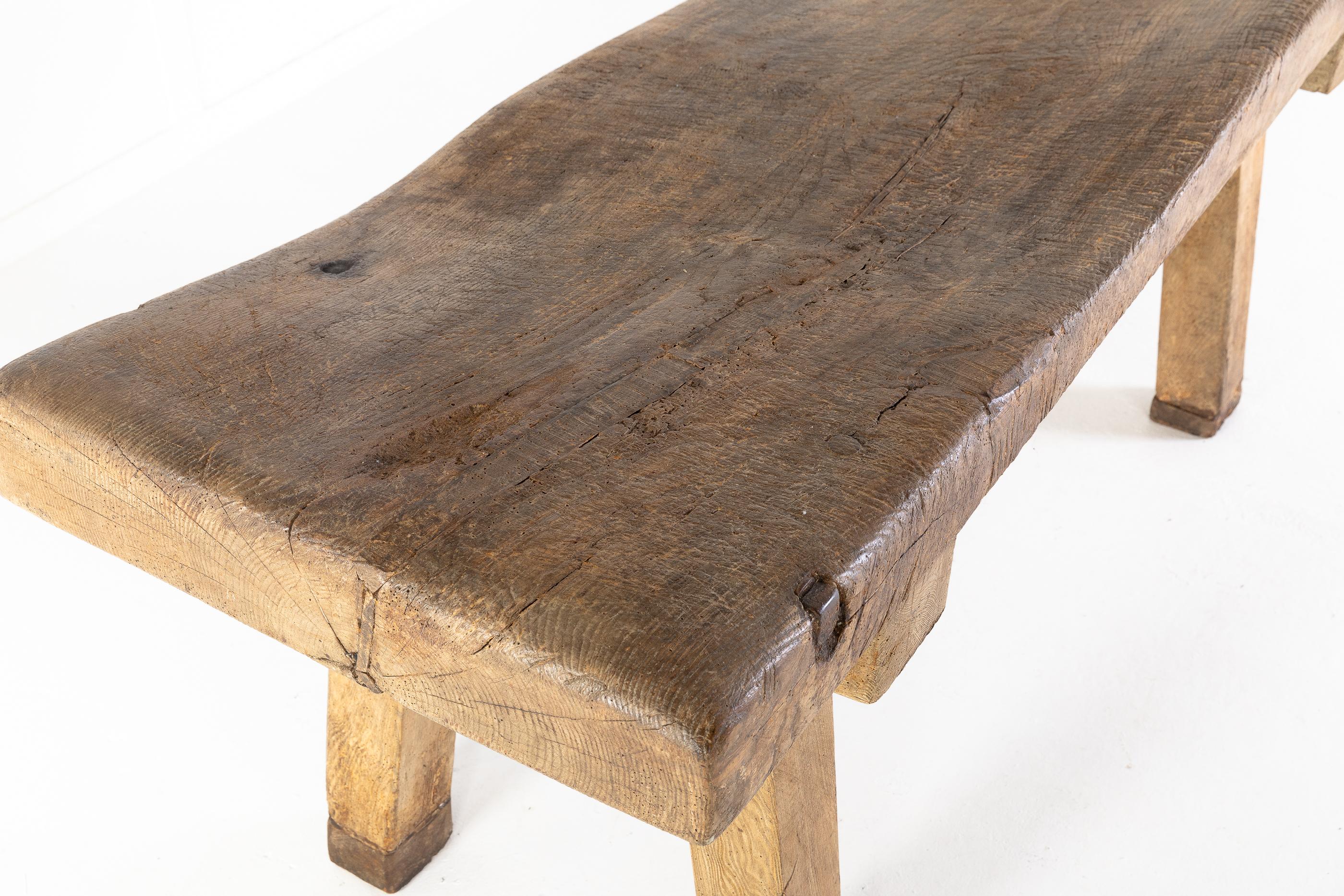 Wonderful rustic 19th century English chopping block with years of use making it an interesting console or side table.

Good heavy table with nice original patination.
 
