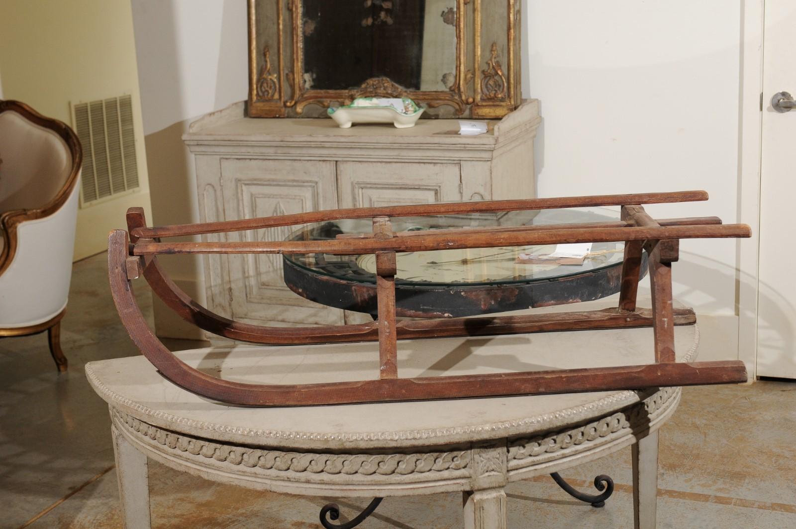 Rustic 19th Century French Wooden Sled with Weathered Patina and Curving Base For Sale 1