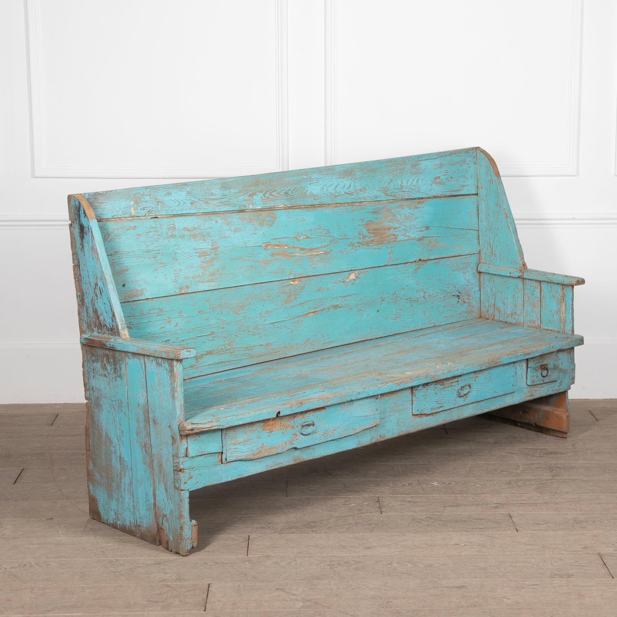A characterful 19th Century painted provincial bench from Northern Italy with three drawers in the frieze beneath the seat.
Old but not original paint.