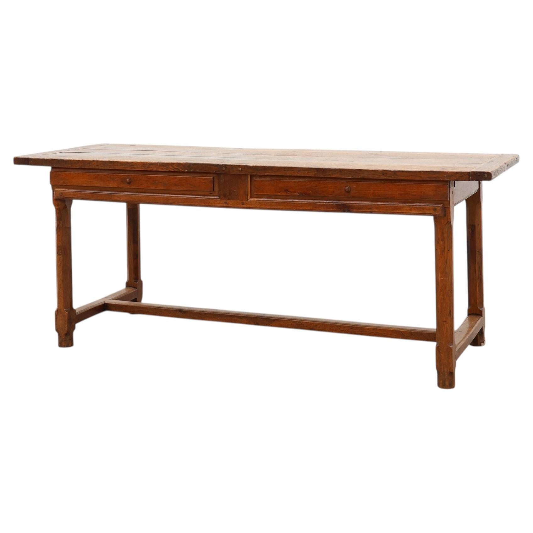 Rustic 19th century oak dinner table with drawers that open laterally, France
