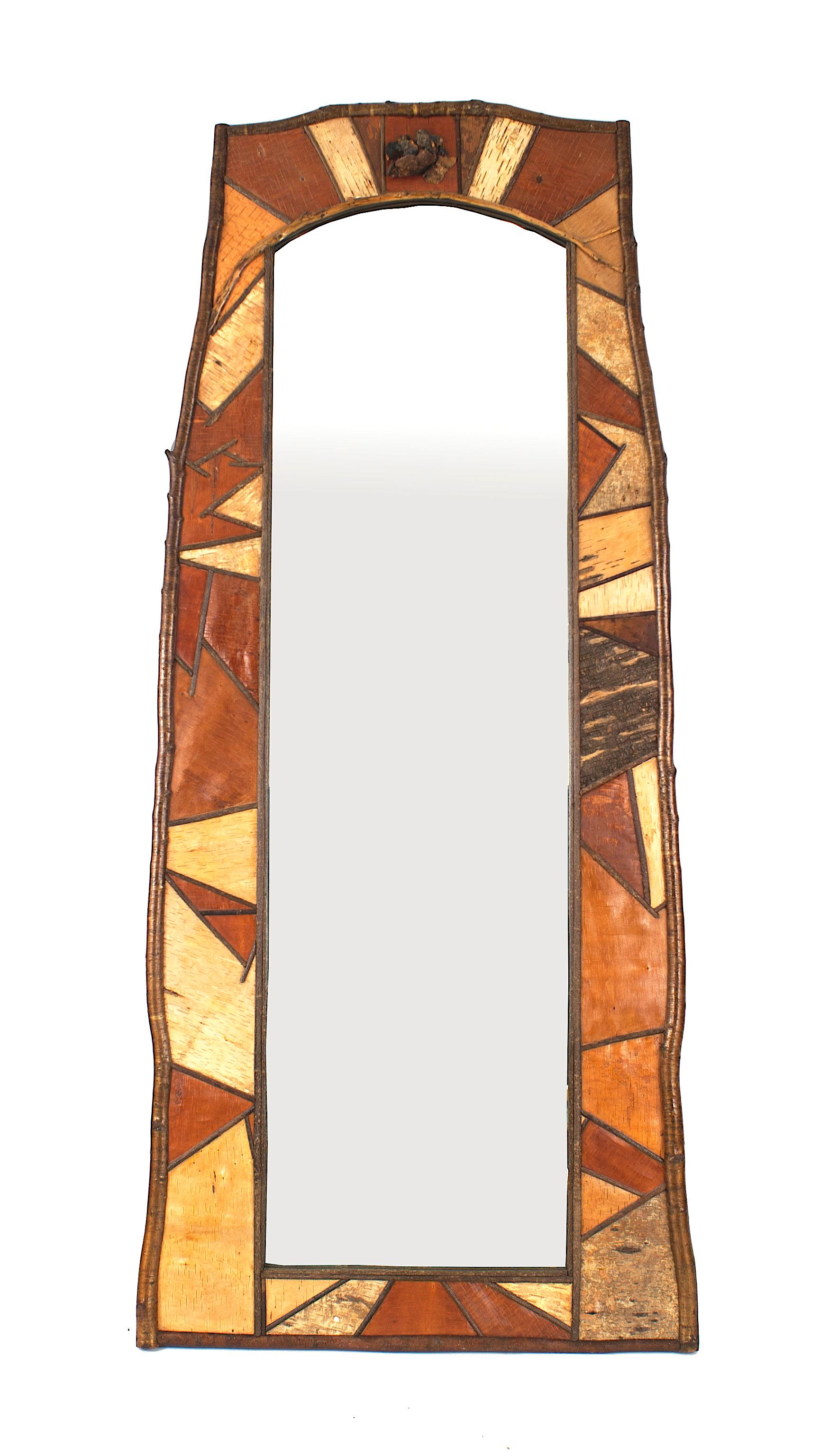 Rustic Adirondack (late 20th Century) asymmetric rectangular tall vertical wall mirror with tan, rust, beige, and gray angular wood veneer panels in a birch frame.
