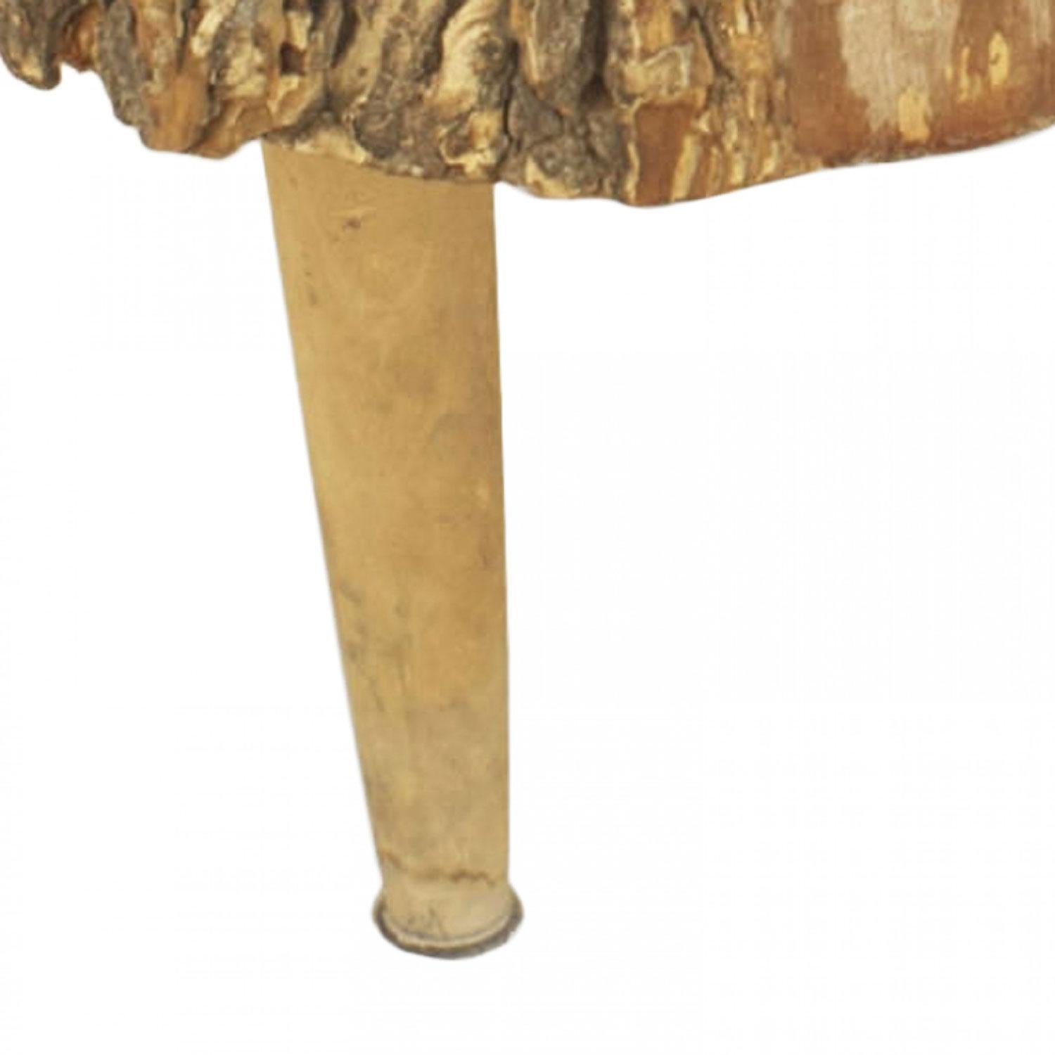 American Country Rustic Adirondack-style (19th Century) tree trunk free form round coffee table supported on four tapered wooden legs.