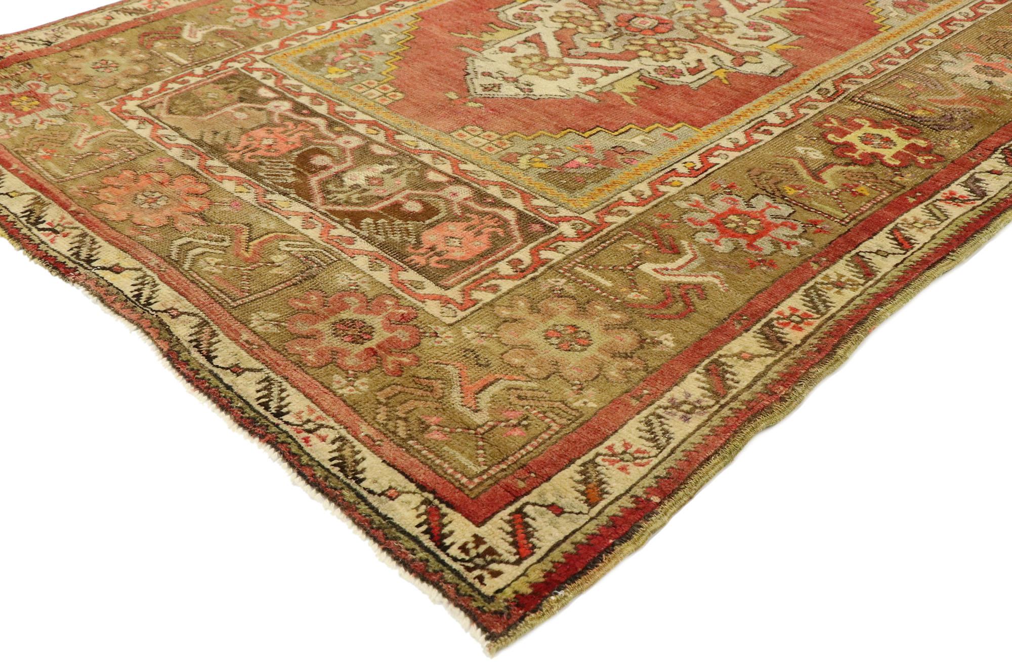 51178 Vintage Turkish Oushak Rug, 03'06 x 05'00. 
This hand-knotted wool vintage Turkish Oushak rug features a cross-like centre medallion in an abrashed scarlet red field. Gray spandrels filled with rosettes, animals and symbolic Anatolian motifs