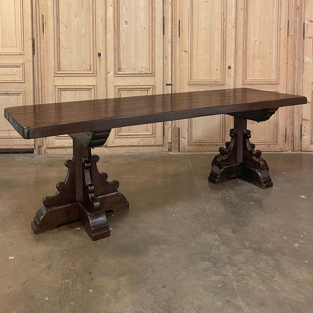Rustic Antique Double Pedestal Banquet Table was literally designed to last for centuries!  Utilizing thick planks and beams of solid old-growth elm wood, the artisans who crafted it used a thick top so sturdy that an apron is unnecessary, allowing