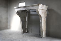 Rustic Antique Fireplace of French Limestone from the 19th Century