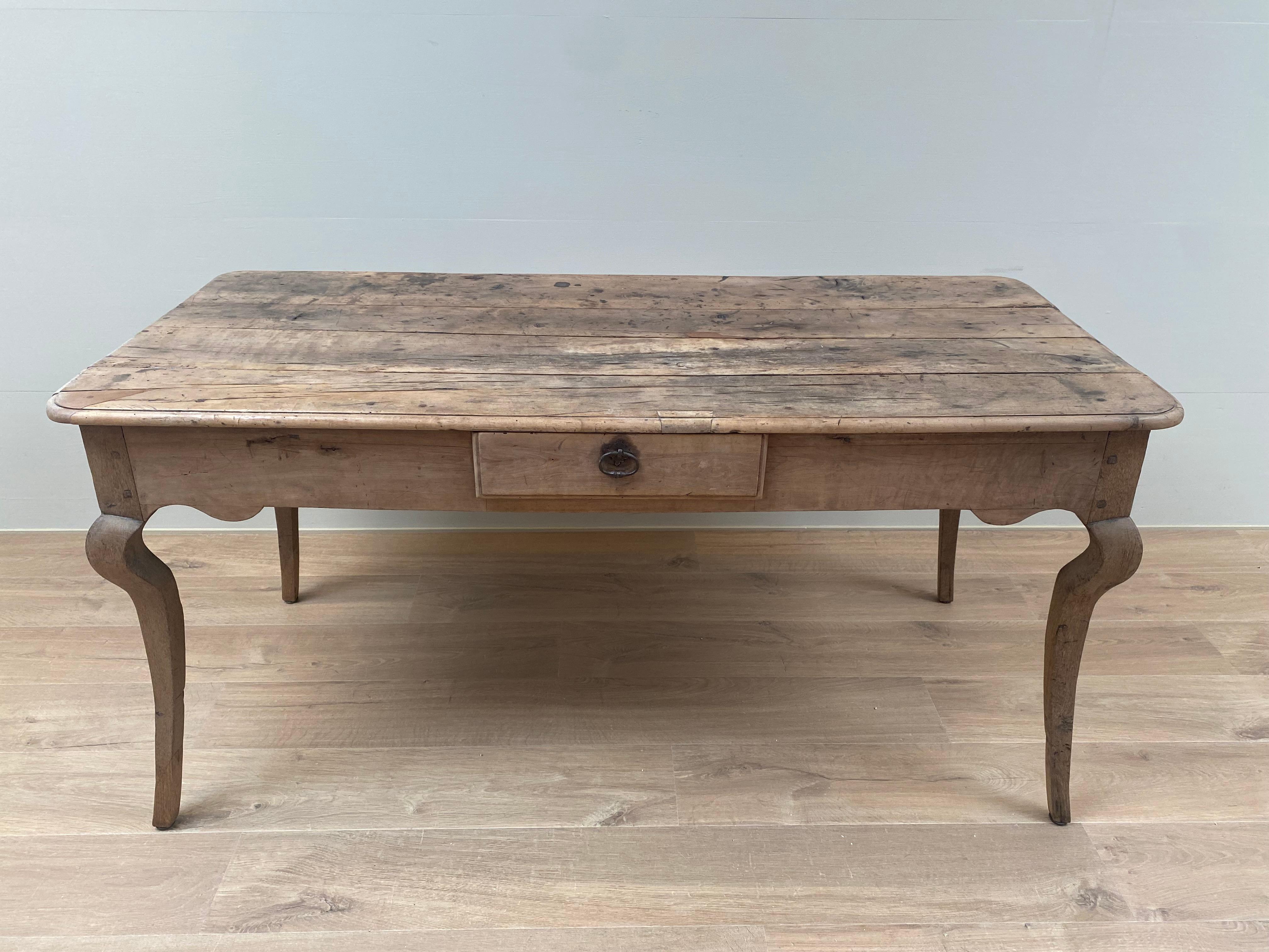 Elegant Rustic French rectangular Antique Table,
France, 1820,
Elegant feet, the table can also be used as a writing desk,
Good, old bleached patina and antique warm and worn shine.
