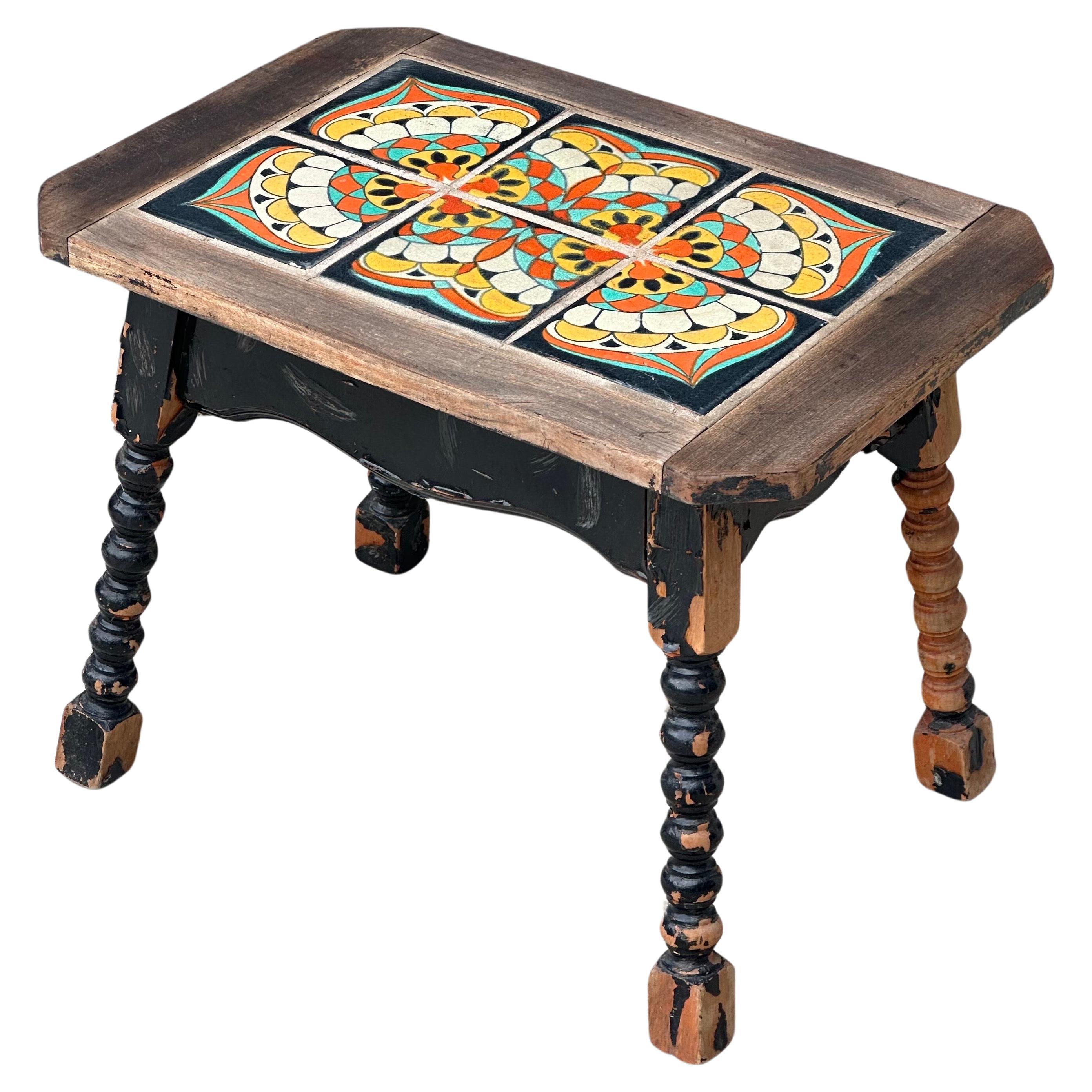 An absolutely exceptional example of an antique Monterey tile topped side table with turned wood legs, circa early 1930s. Completely original, from the 