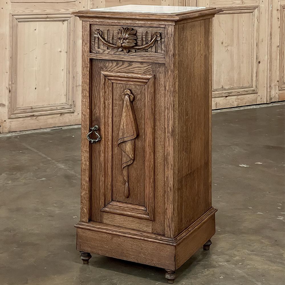Rustic Antique Neoclassical Marble Top Nightstand ~ Pedestal is an intriguing piece, being just shy of three feet tall yet only sixteen inches square. Featuring a drawer and a cabinet, it could easily serve in a cozy bedroom by the side of the bed,
