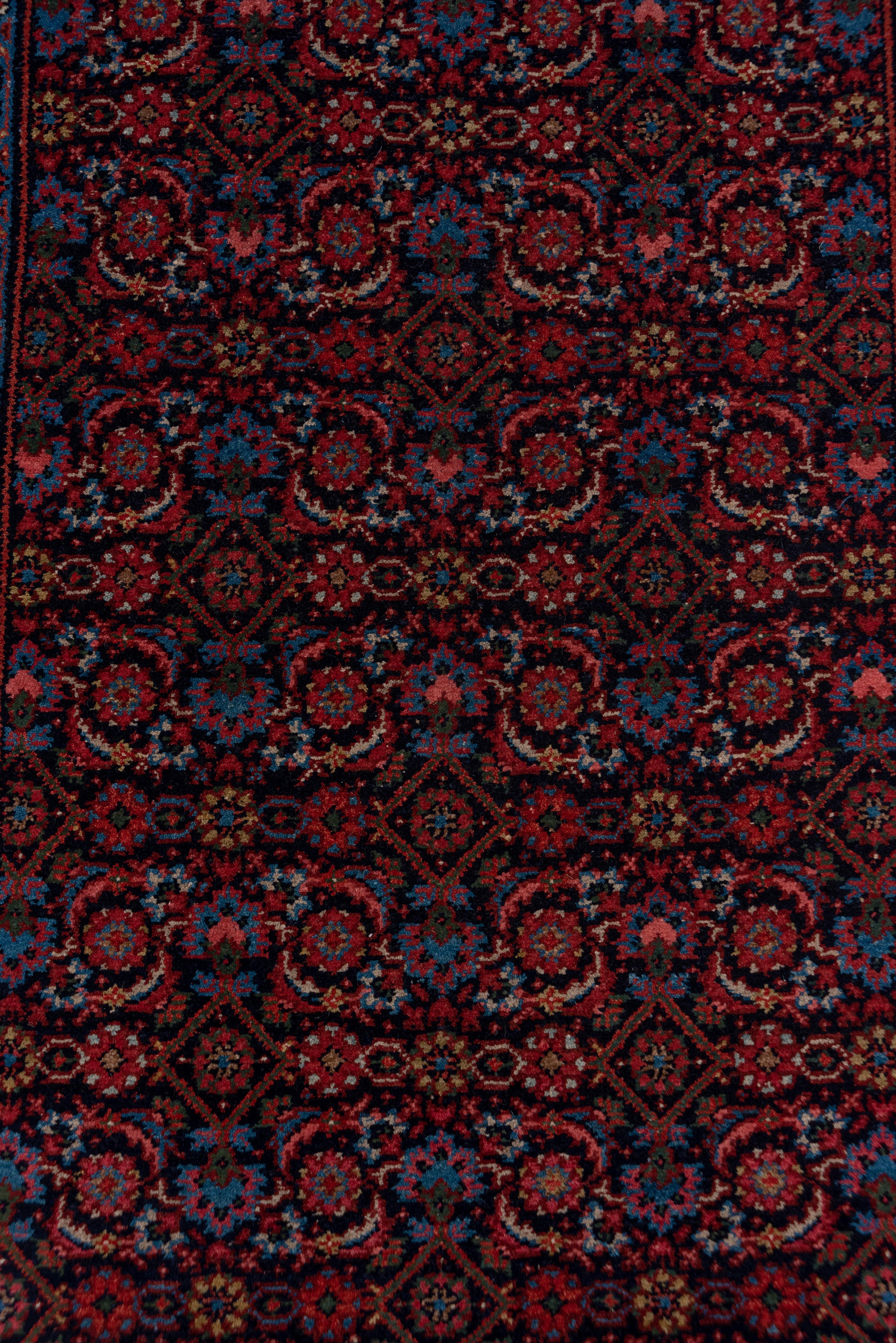 Mid-20th Century Rustic Antique Persian Enjelas Long Runner, Herati Design, Bold Colors For Sale