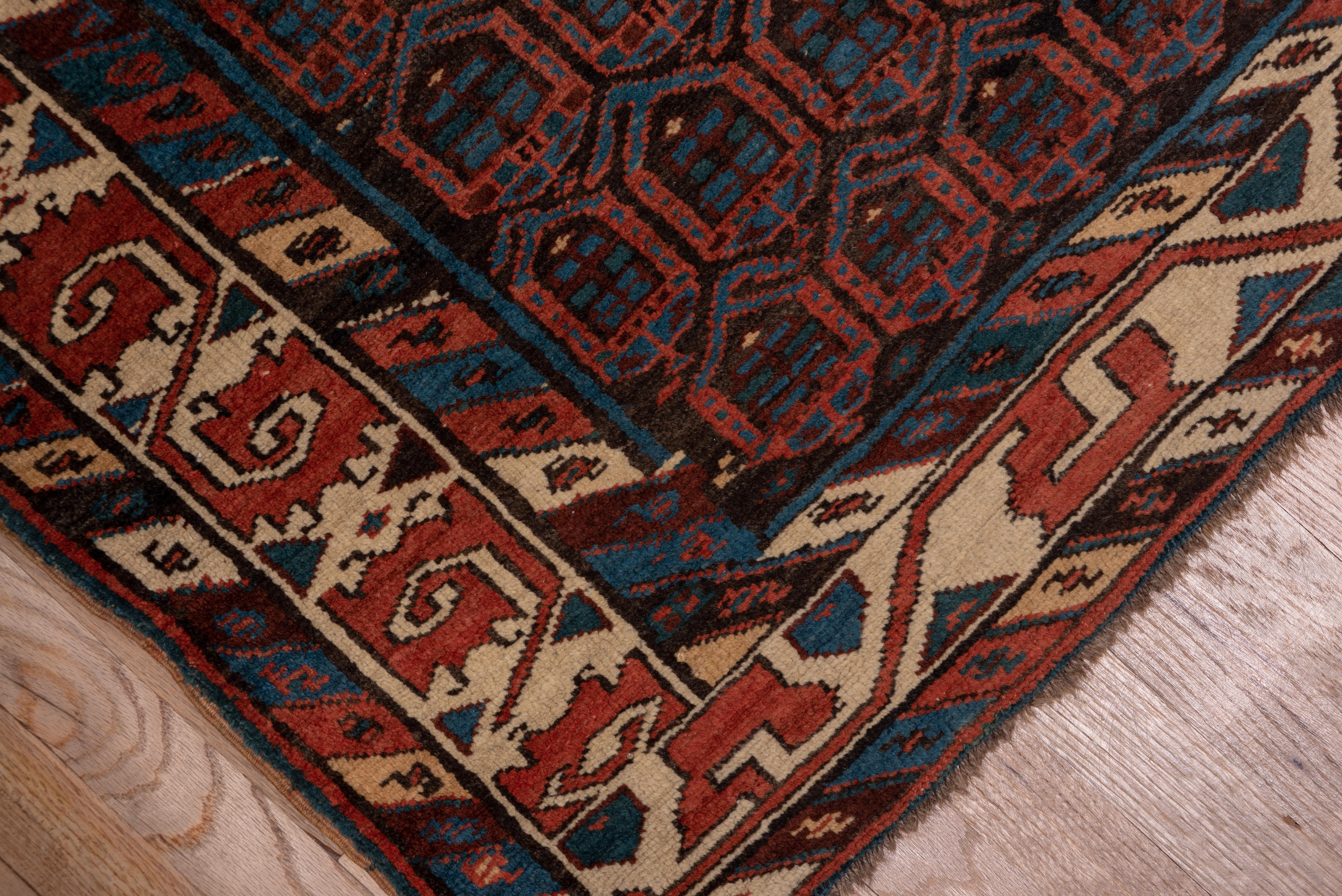 Early 20th Century Rustic Antique Persian Sarab Runner, Brown Red & Blue Allover Field, circa 1920s For Sale