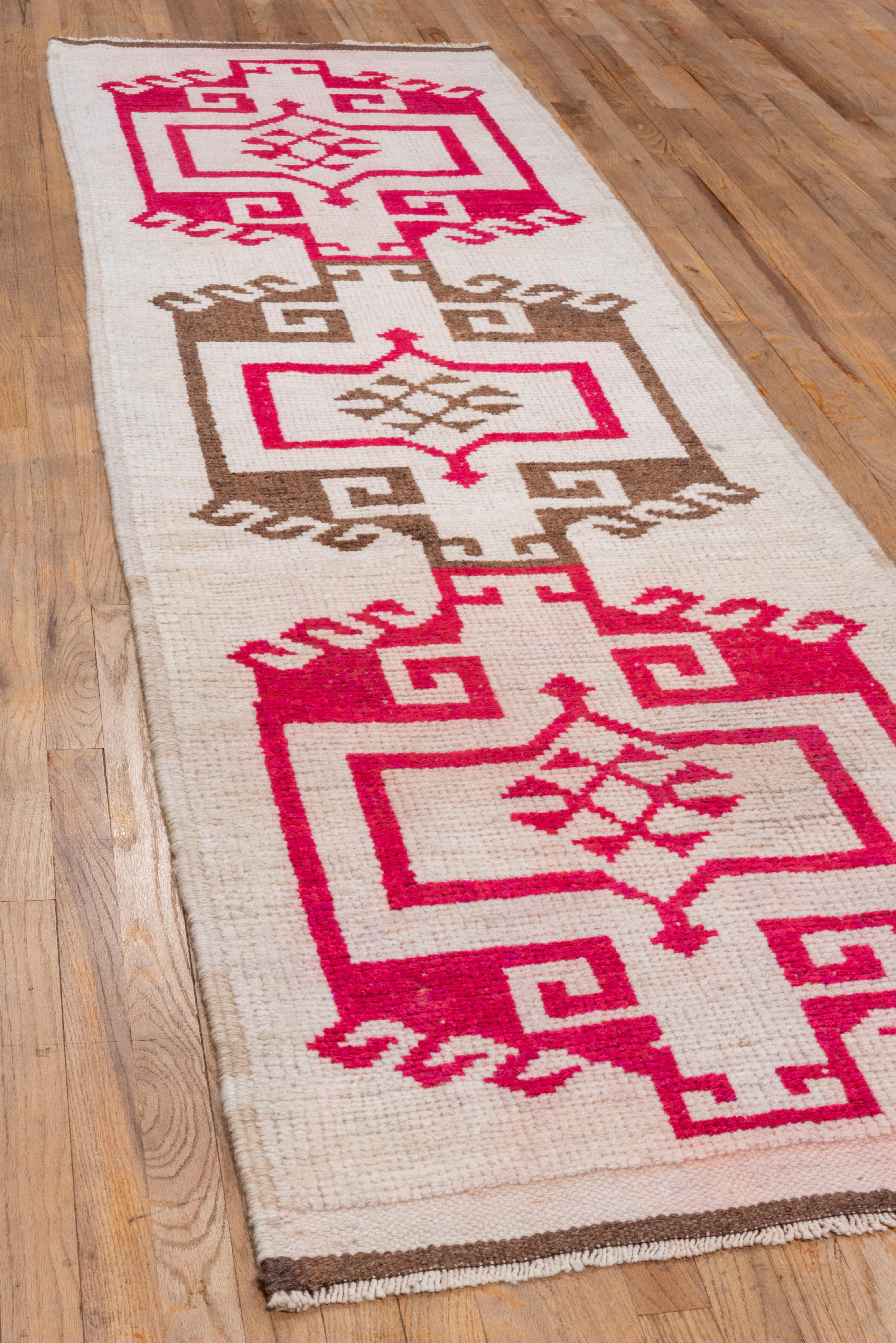 Hand-Knotted Rustic Antique Turkish Kars Runner, White Background, Brown & Pink Accents For Sale