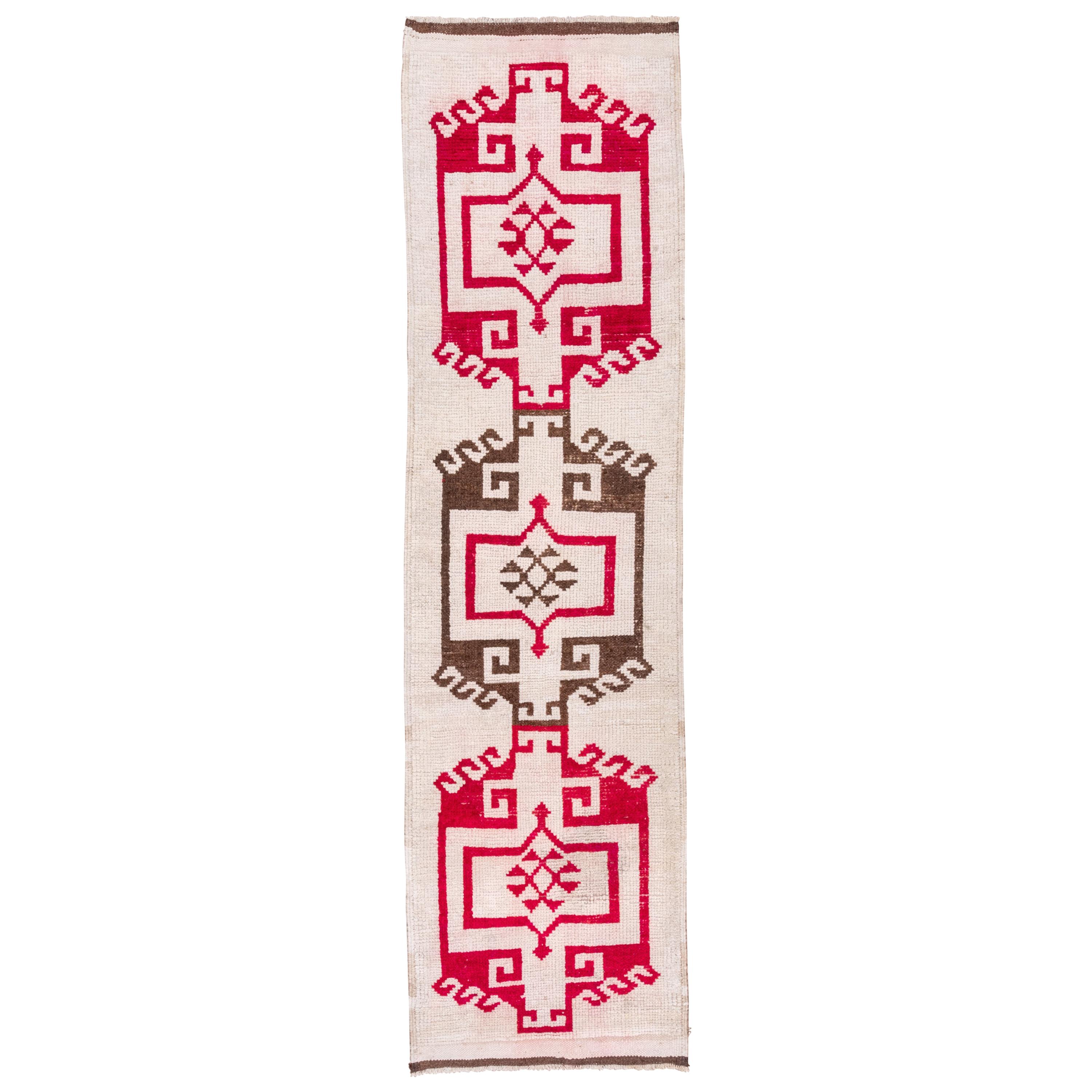 Rustic Antique Turkish Kars Runner, White Background, Brown & Pink Accents For Sale