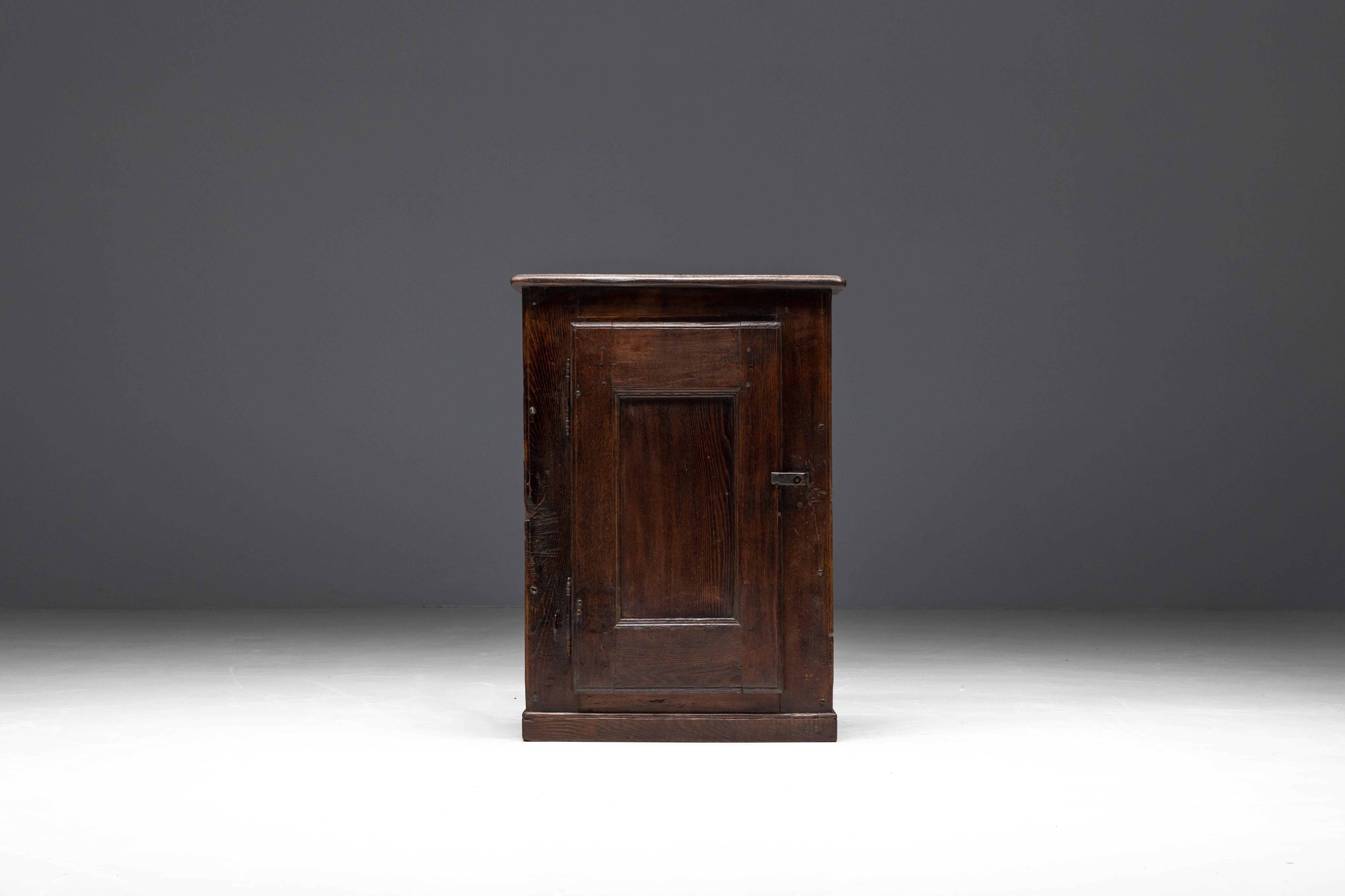 19th-century rustic cupboard handcrafted of solid wood and hailing from the Cévennes region. This piece, formerly used as a 