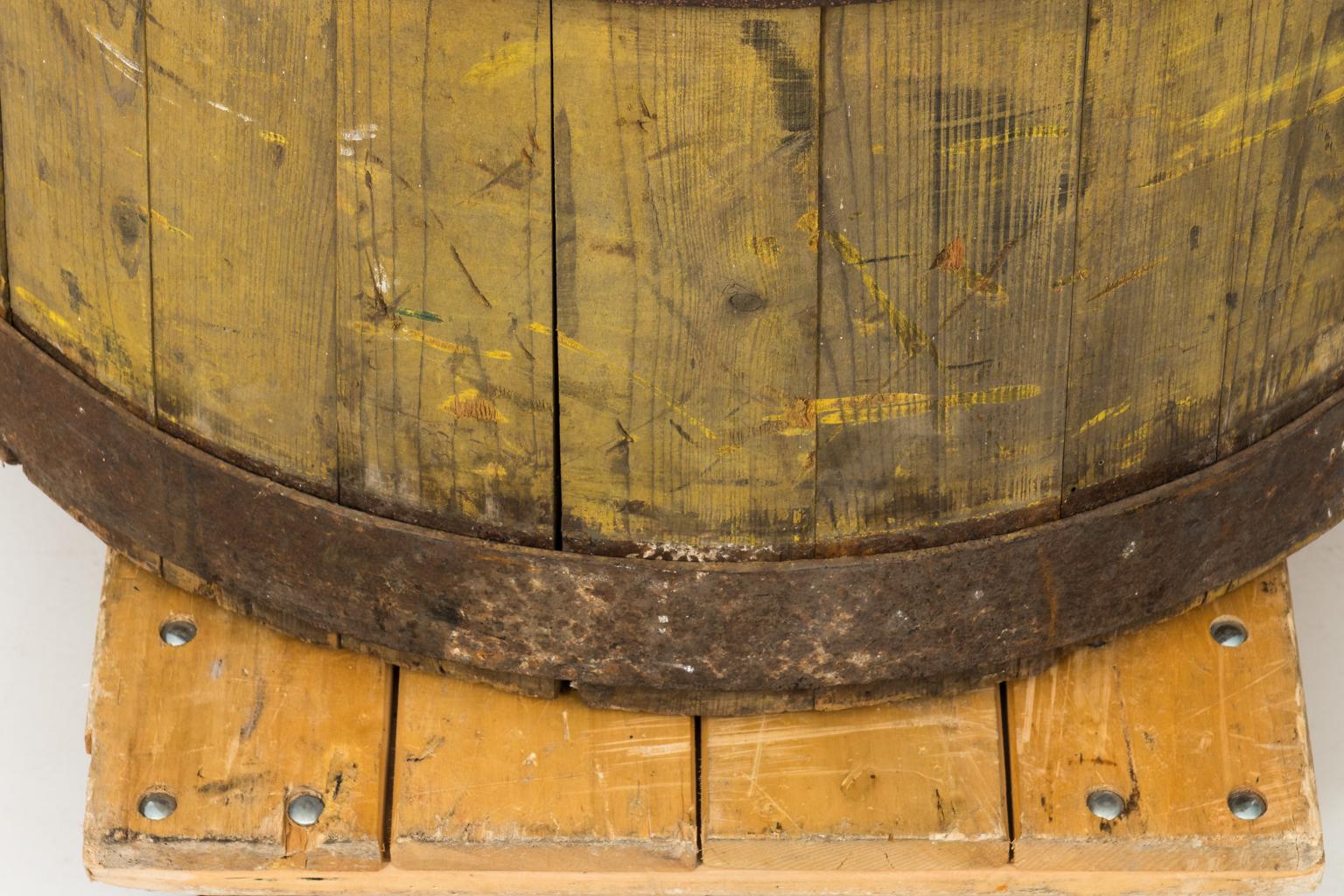 Antique strap steel painted farm barrel.
 