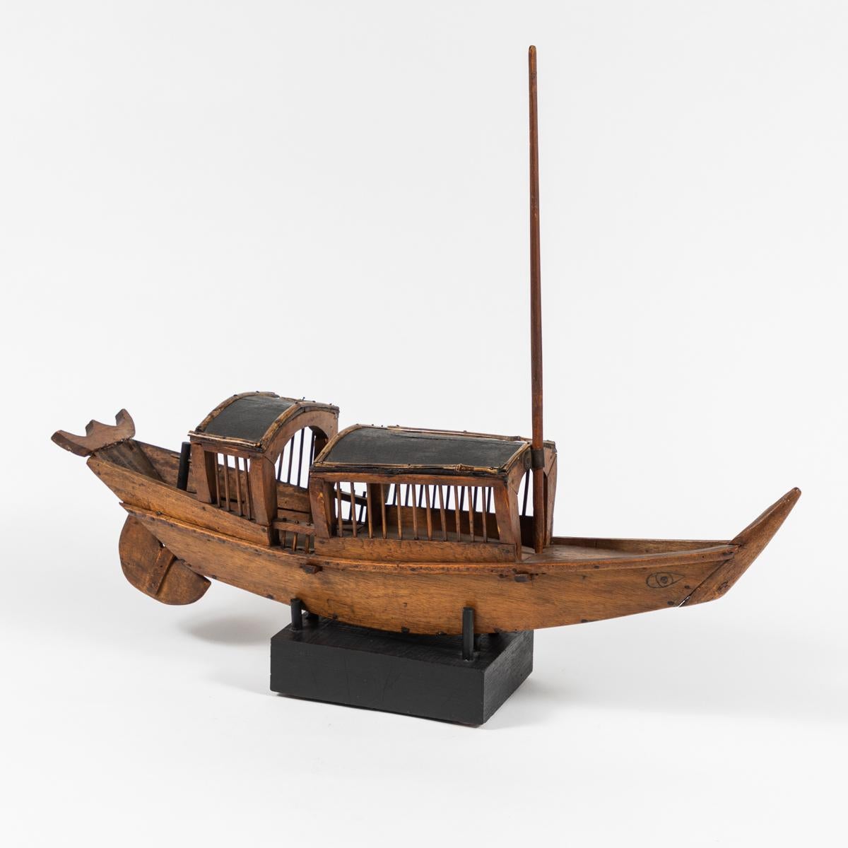 Fabulous 19th-century Belgian large wooden model of a fishing boat, with exquisite attention to detail. One-of-a-kind and marked by a humble dignity, the architectural modeling captures a spirit of simplicity and time-honored tradition.  A beautiful
