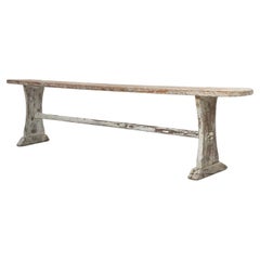 Antique rustic bench with a wooden top and white paint, France ca. 1900