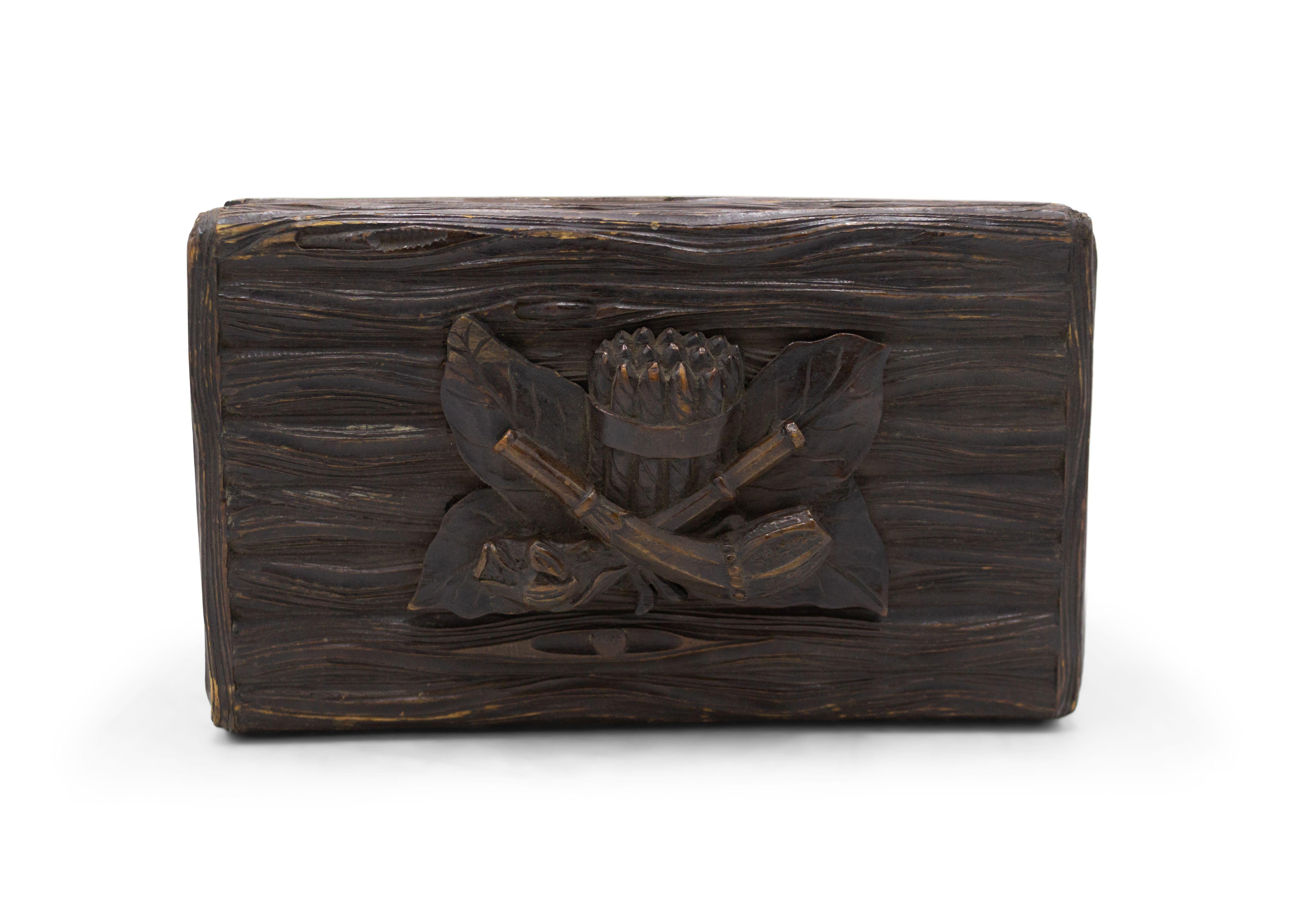 Rustic Black Forest (19thcentury) walnut carved humidor box with faux wood design and smoking motif on top (interior of top has smoking accessories).
       