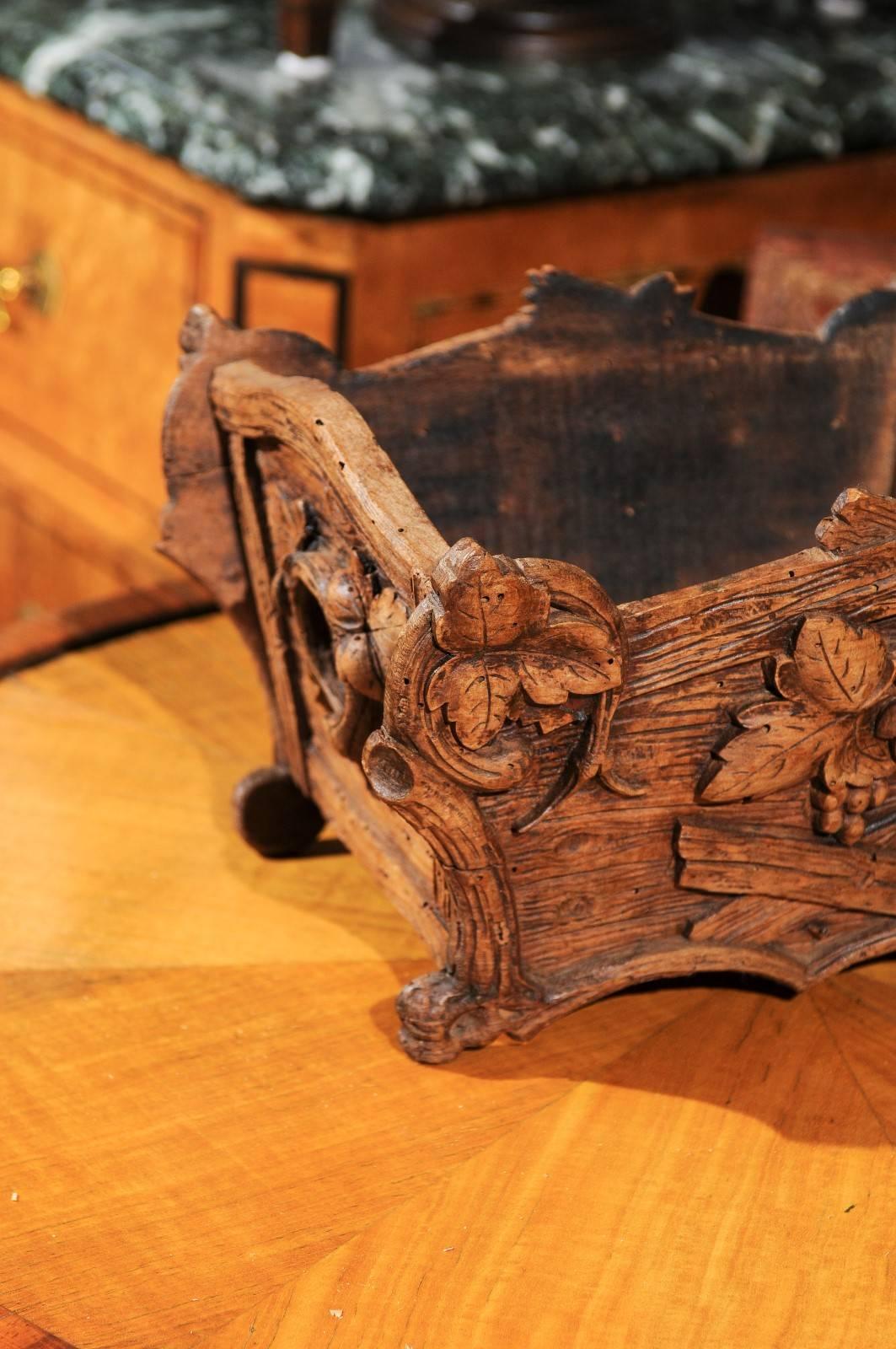 Swiss Rustic Black Forest Jardinière with Carved Foliage and Branch Motifs, 1920s