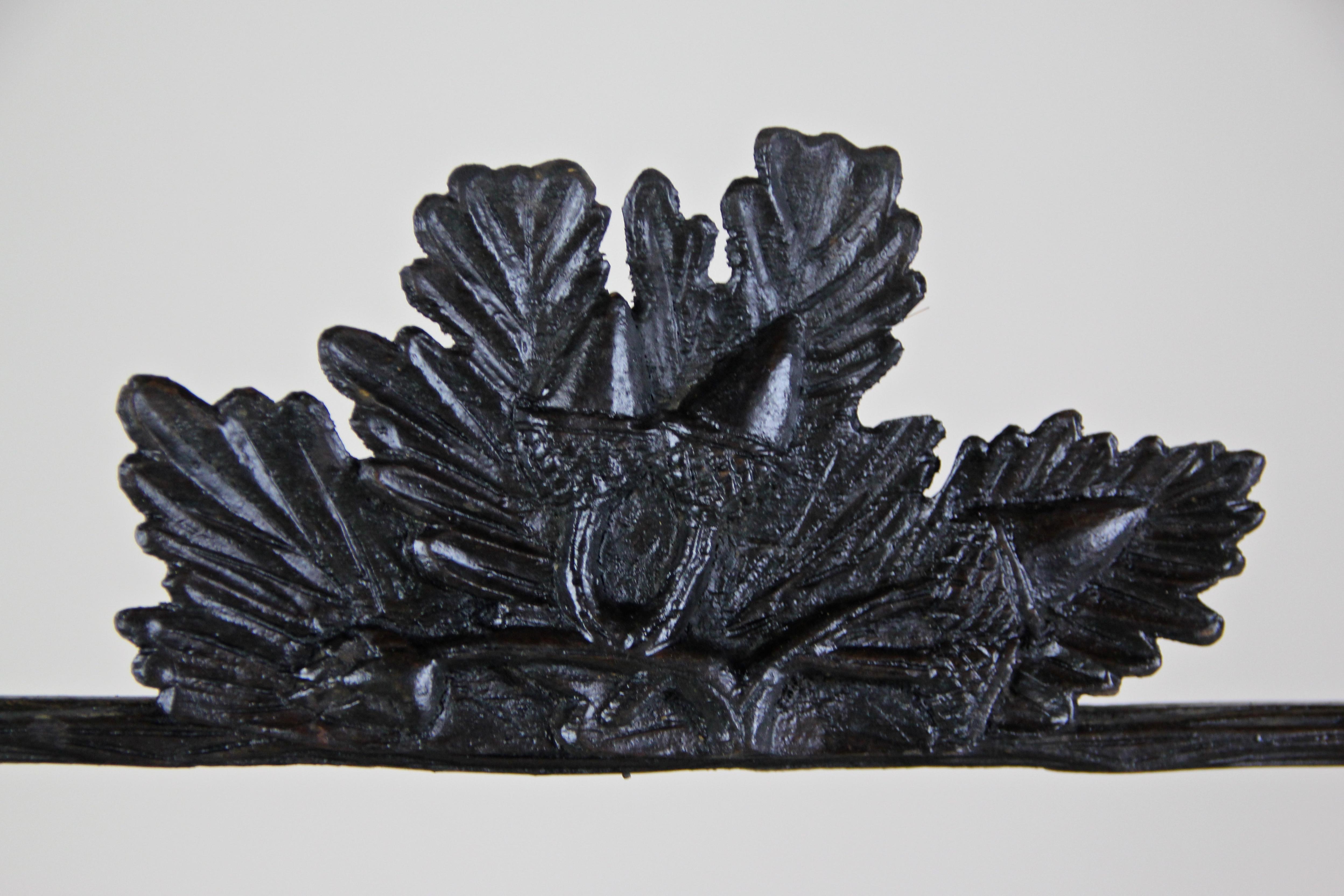 Austrian Rustic Black Forest Mirror Hand Carved with Oak Leaves, Austria, circa 1880 For Sale