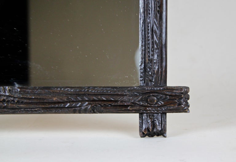 Stained Rustic Black Forest Wall Mirror Hand Carved, Austria, circa 1890 For Sale