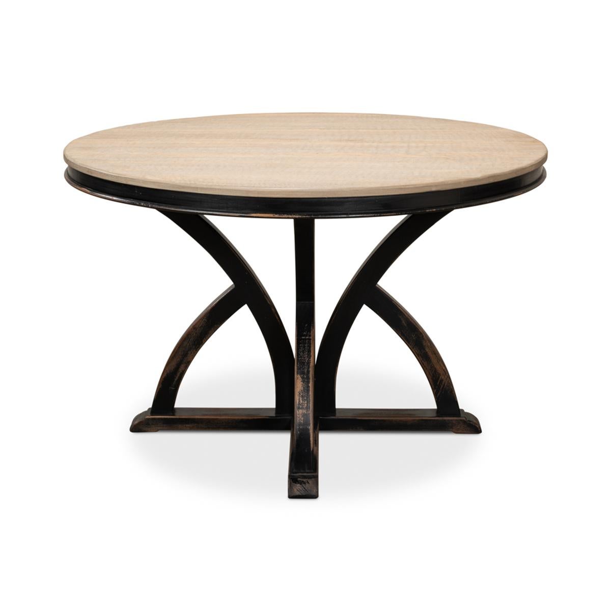 Rustic round bleached pine top dining table on an unusual painted black distressed base.

Dimensions: 48