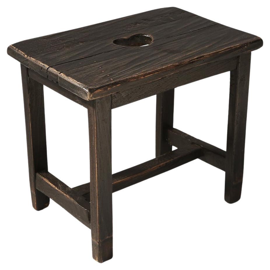 Rustic Black Wooden Stool, circa 1920