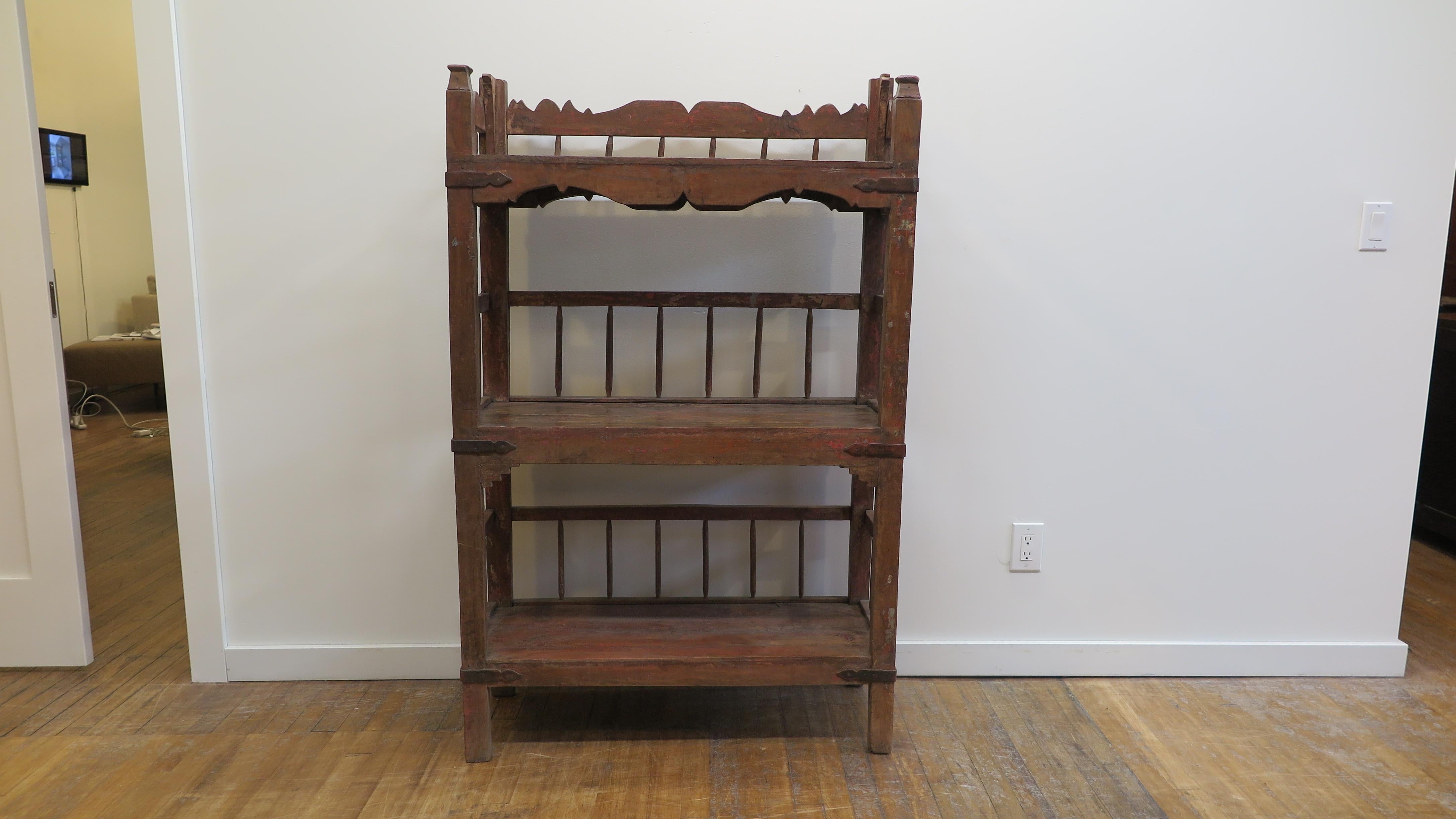 Rustic Bookcase, Etagere, Shelf. Wonderful Rustic Bookcase Shelfing piece having three shelf platforms with doweled back rail. Interesting piece with strong rustic patina. Sturdy for use, having an old repair pictured to the top back rail. A warm