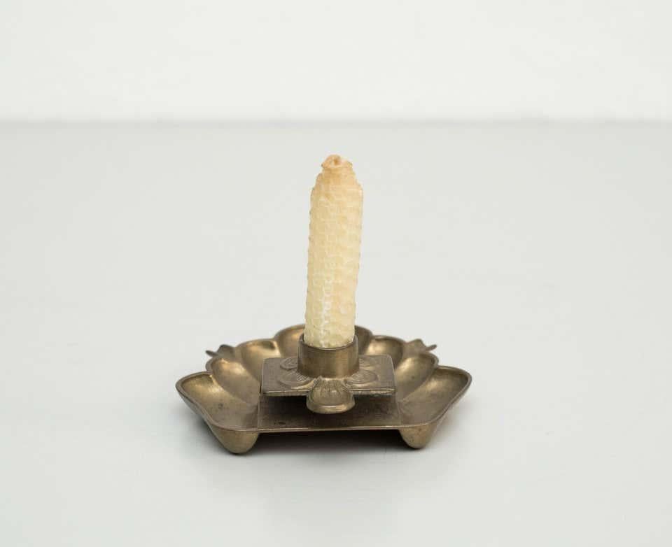Rustic Brass Candle Holder – Circa 1970, Made in Spain, By Unknown Manufacturer

This rustic brass candle holder, dating back to circa 1970 and crafted in Spain by an unknown manufacturer, is a beautiful example of vintage craftsmanship. The piece