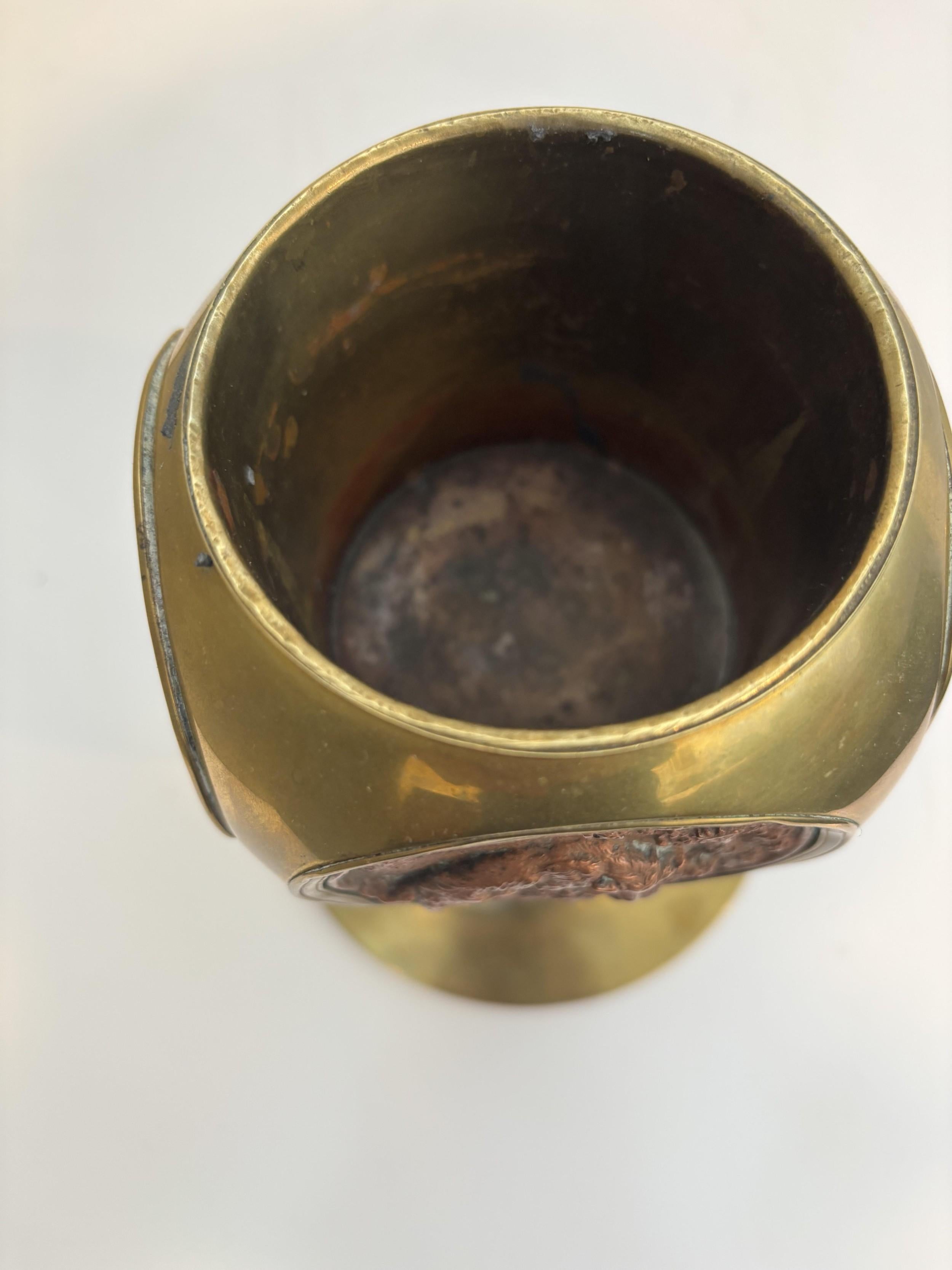 Ash Rustic brass container with 4 copper medalions For Sale