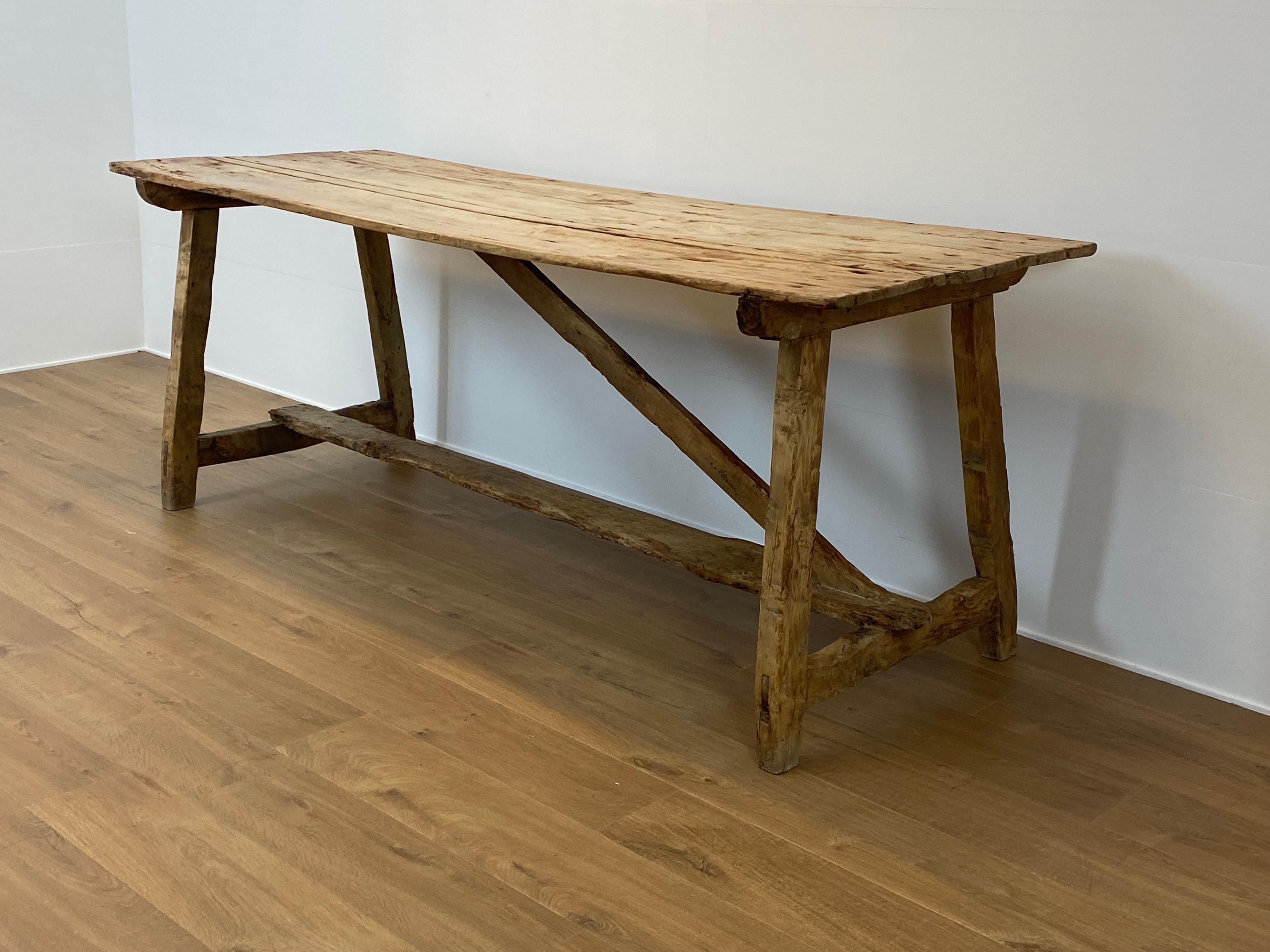 Superb Spanish Farm Table from the Catalan Region from around 1900,
the table has a great Patina and has the perfect characteristics regarding use and wear,
the table has the correct bleached color,
ideal to use in the kitchen or as a working table