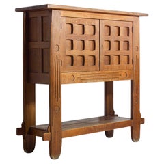 Rustic brutalist bar cabinet in solid oak, France 1940s