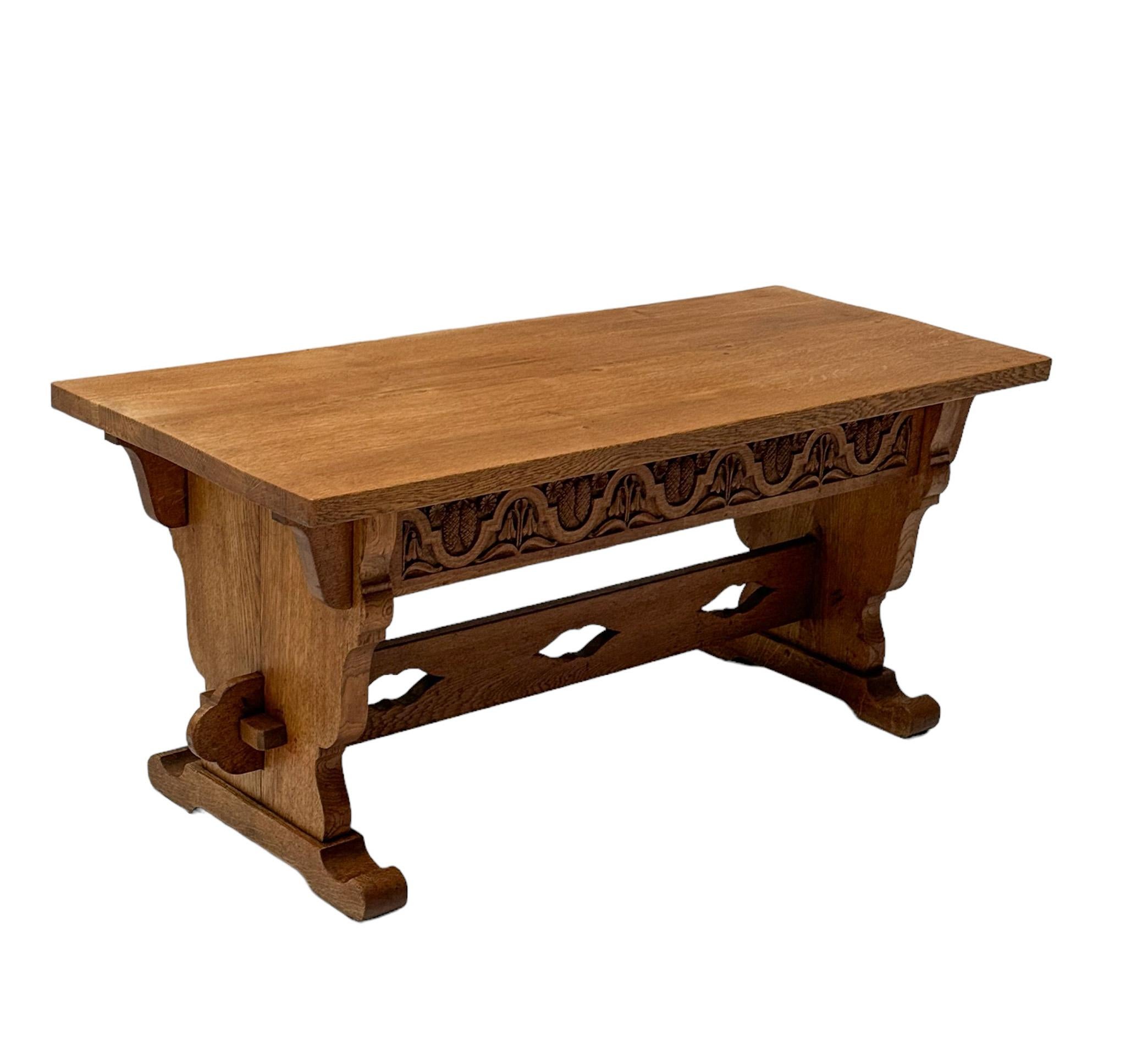 Magnificent and rare Rustic Brutalist coffee table.
Design by Anton Fortuin.
Striking Dutch design from the 1940s.
Solid oak with hand-carved elements.
This wonderful Rustic Brutalist coffee table by Anton Fortuin was designed and manufactured for