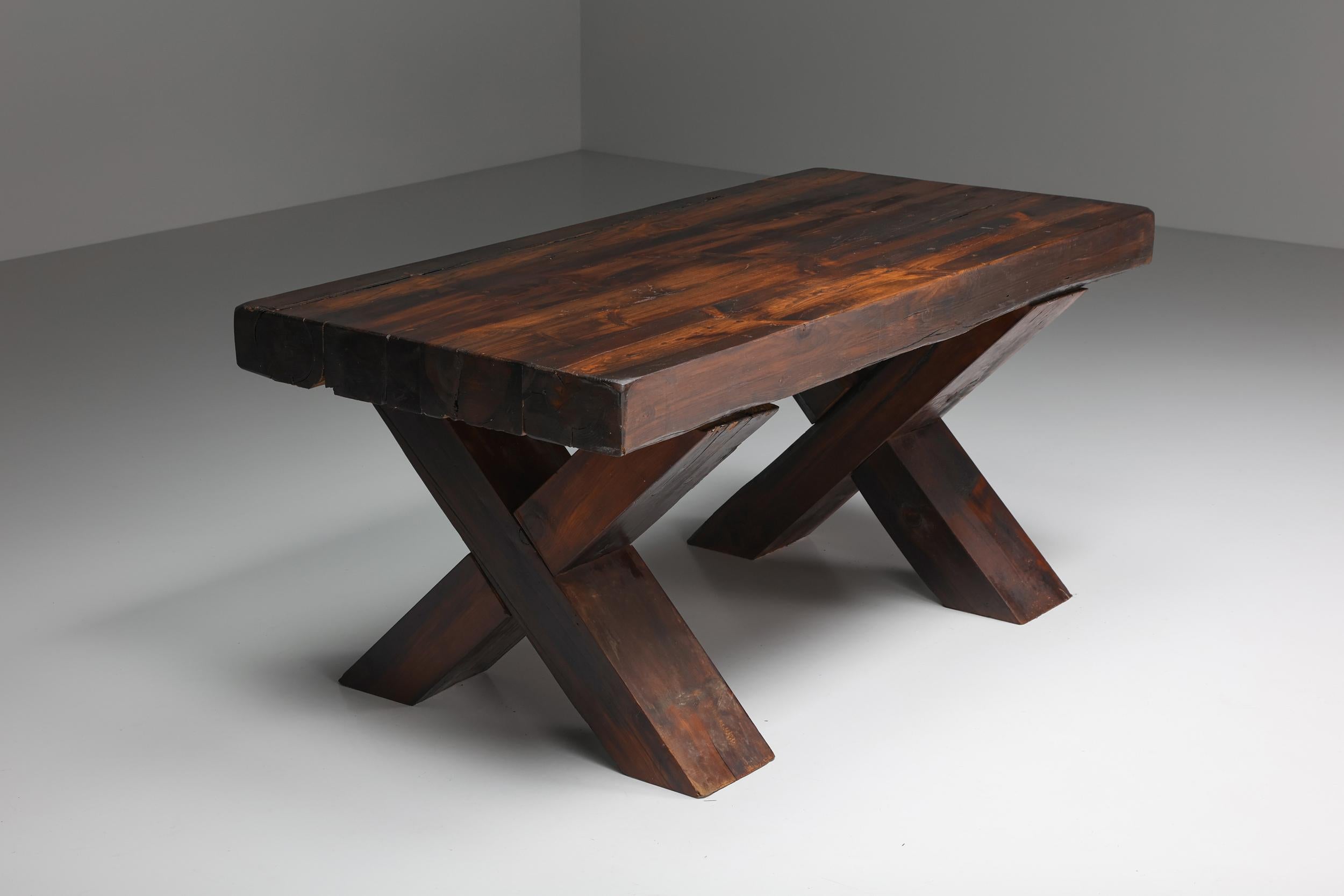 Mid-20th Century Rustic Brutalist Dark Wooden Dining Table with X-Legs, Italy, 1940's For Sale