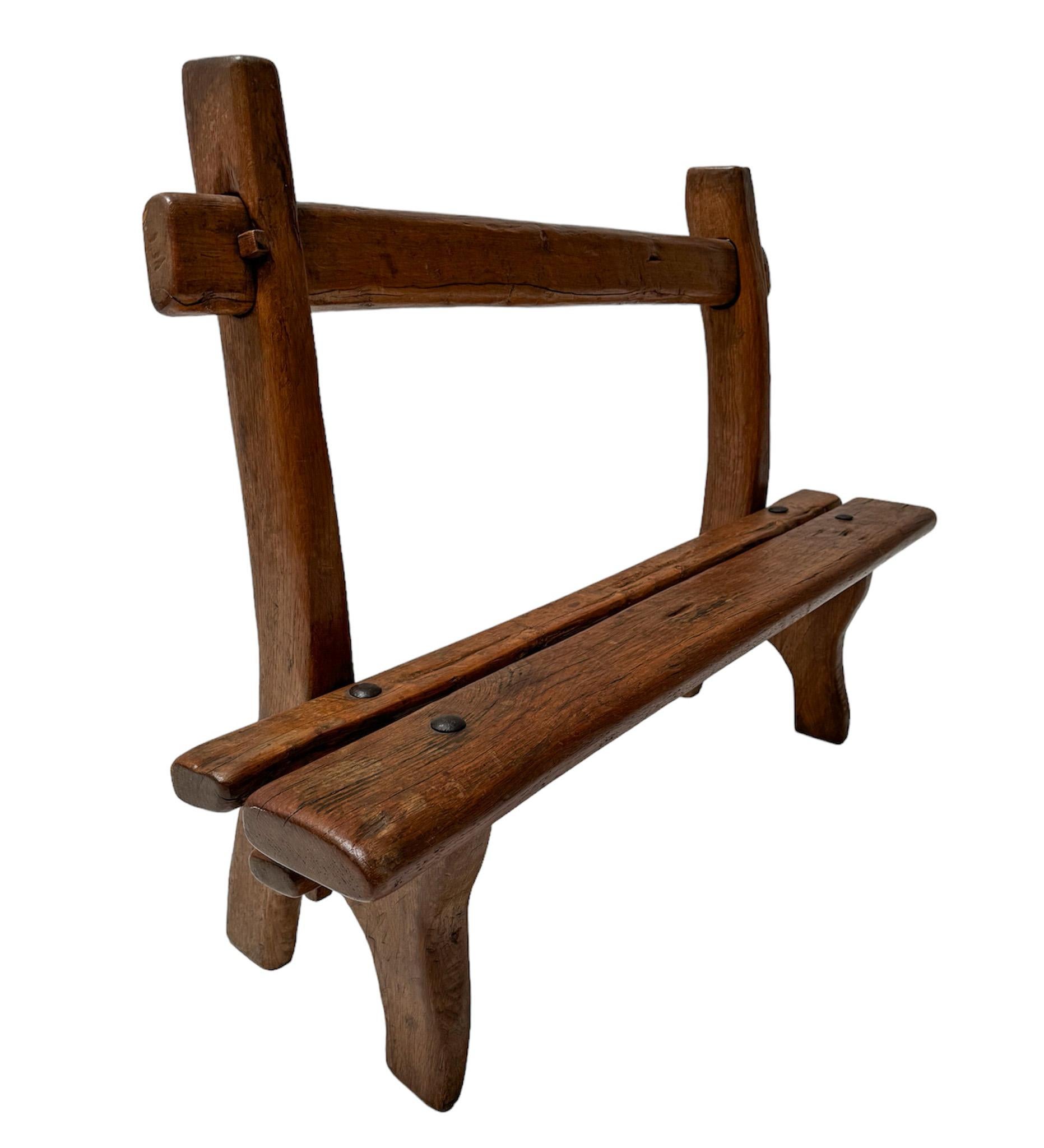 Stunning and rare Rustic Brutalist small bench.
Striking French design from the 1960s.
Solid oak frame with original iron elements.
This wonderful Brutalist small bench is in very good original condition with minor wear consistent with age and use,