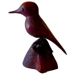 Oiseau rustique en bois sculpté sur pied